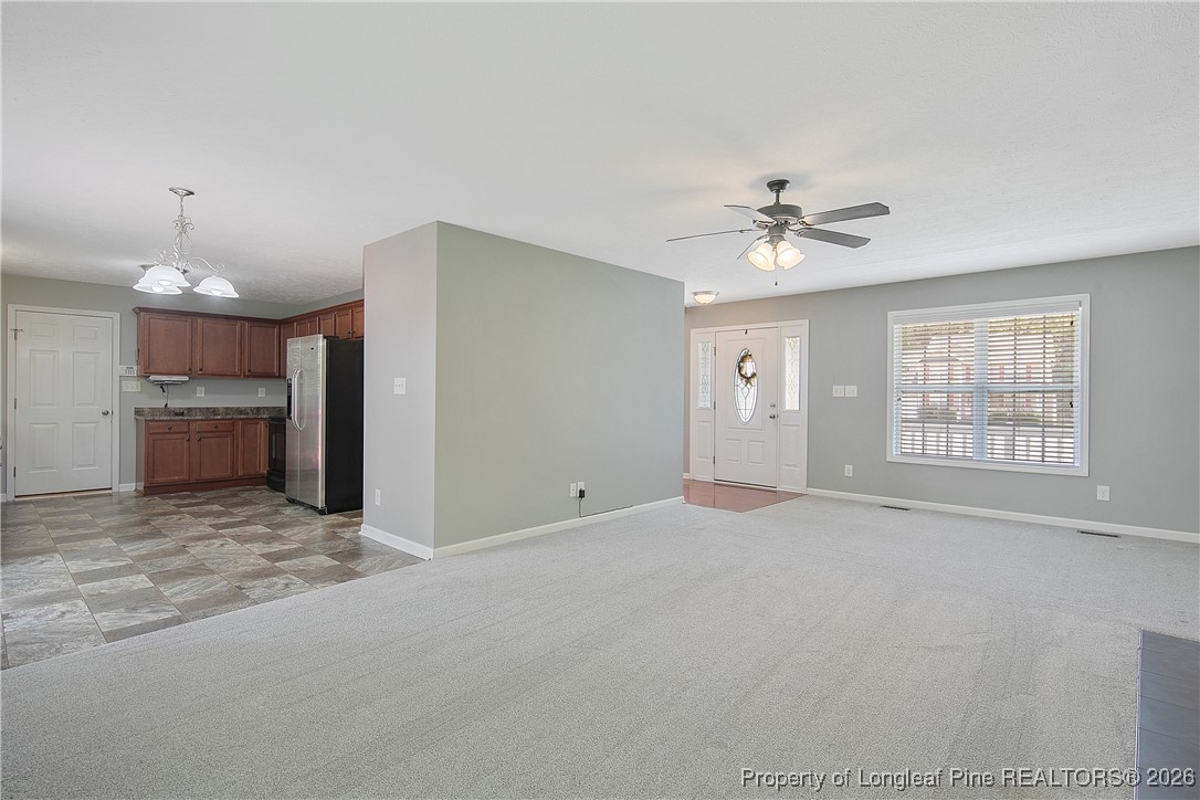 15 Rockingham Street Spring Lake, NC 28390 - Photo 6 of 15 a view of an empty room with a window