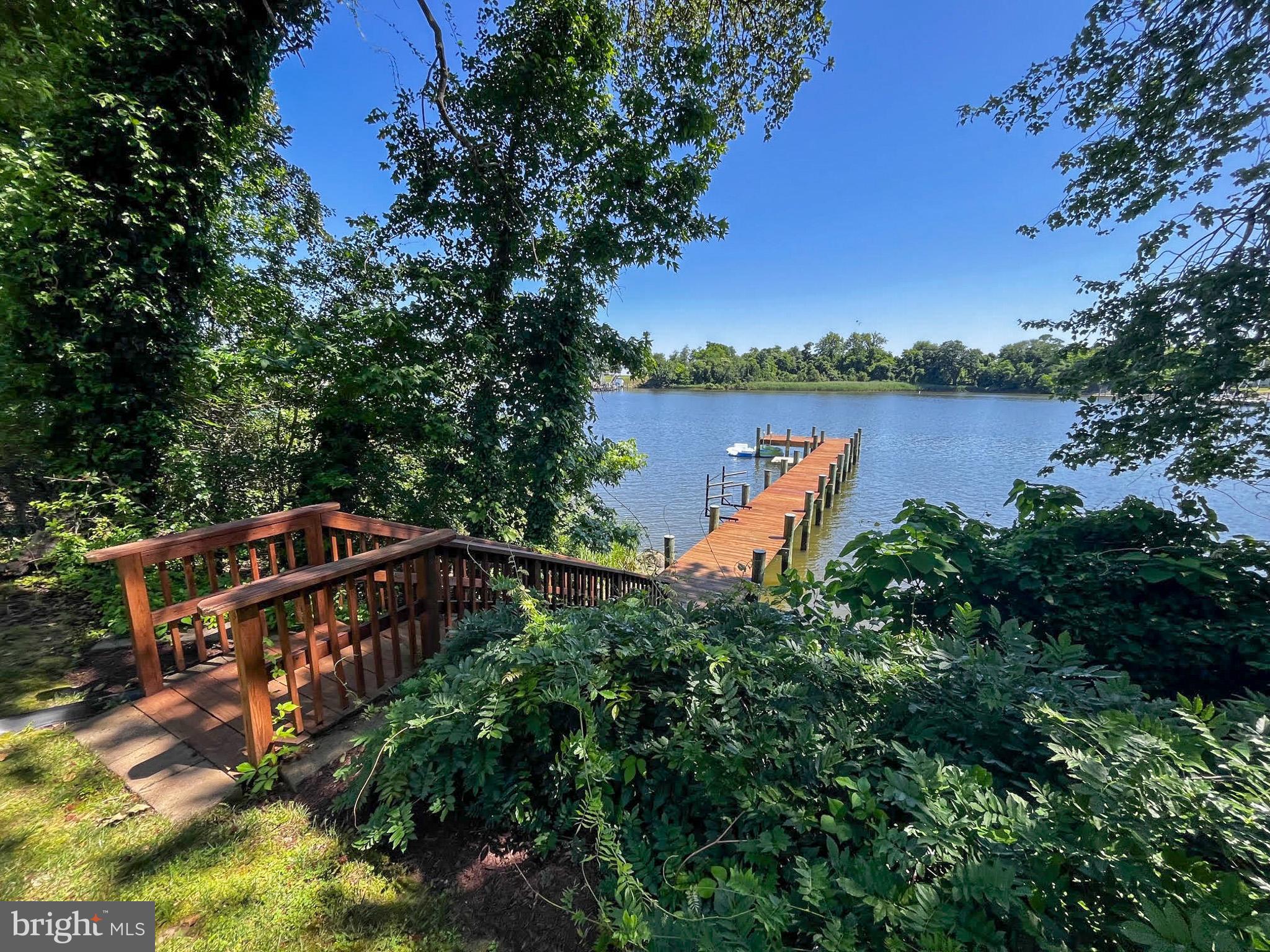 Lot 17 Vinter Lane Pasadena, MD 21122 - Photo 22 of 42 an aerial view of a house with a yard and lake view