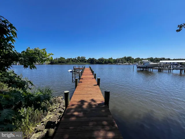 a lake view with sitting space and garden view