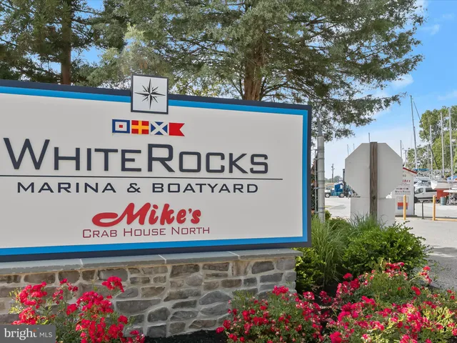 a sign on the wall of building