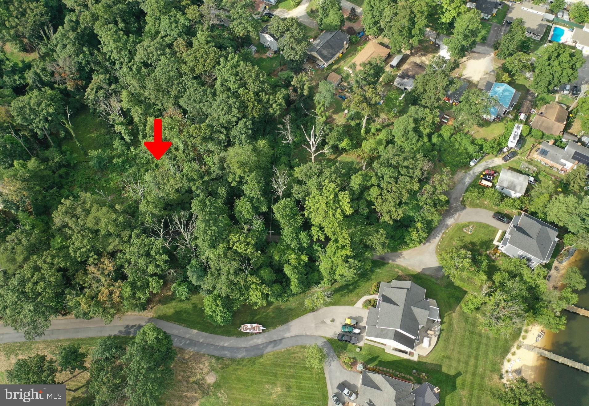 Lot 17 Vinter Lane Pasadena, MD 21122 - Photo 37 of 42 an aerial view of residential house with outdoor space and trees all around