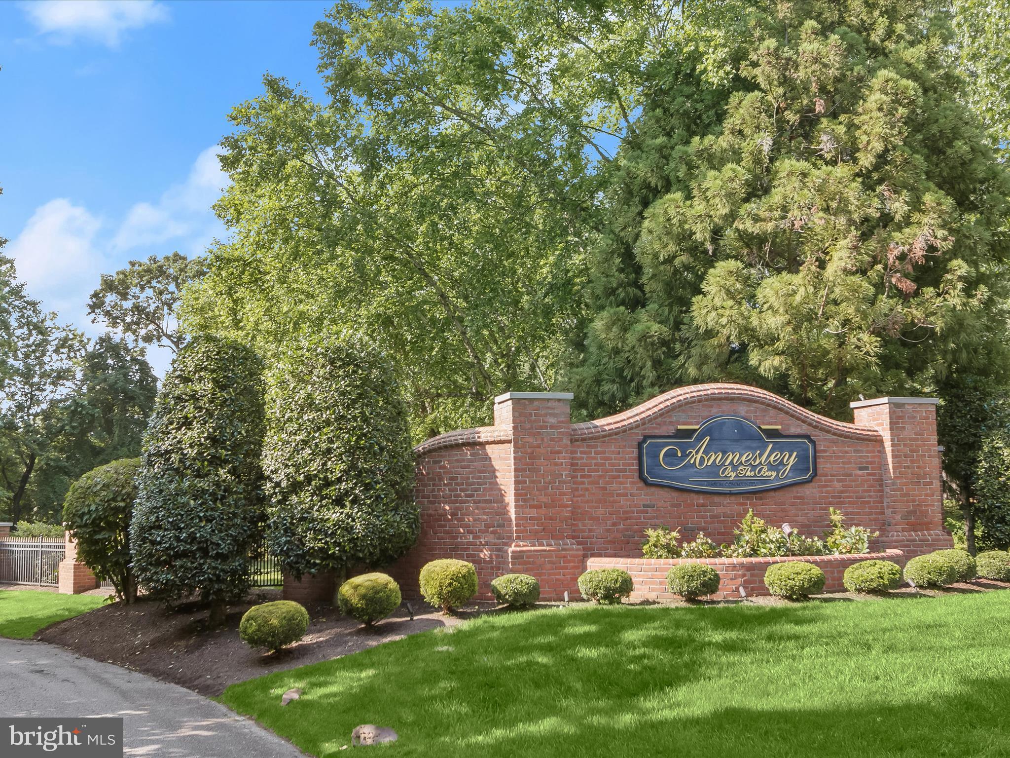 Lot 17 Vinter Lane Pasadena, MD 21122 - Photo 5 of 42 a sign that is sitting on a wooden fence