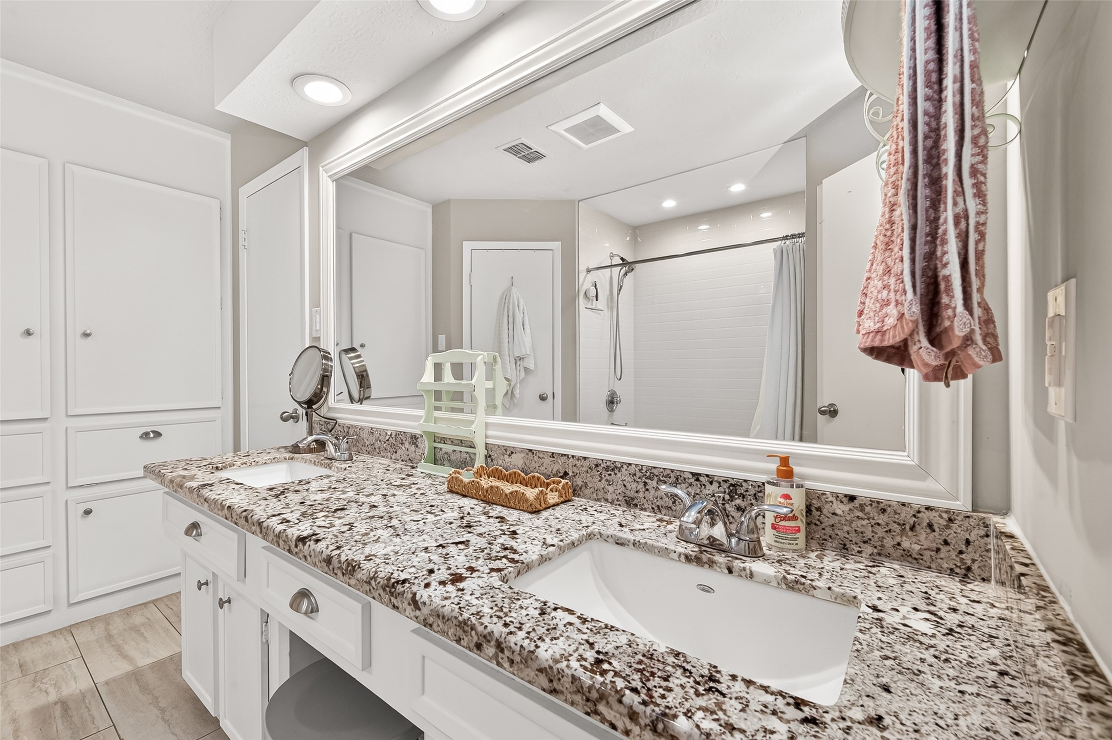 17611 Sorrell Ridge Drive Spring, TX 77388 - Photo 39 of 50 a bathroom with a granite countertop sink and a mirror
