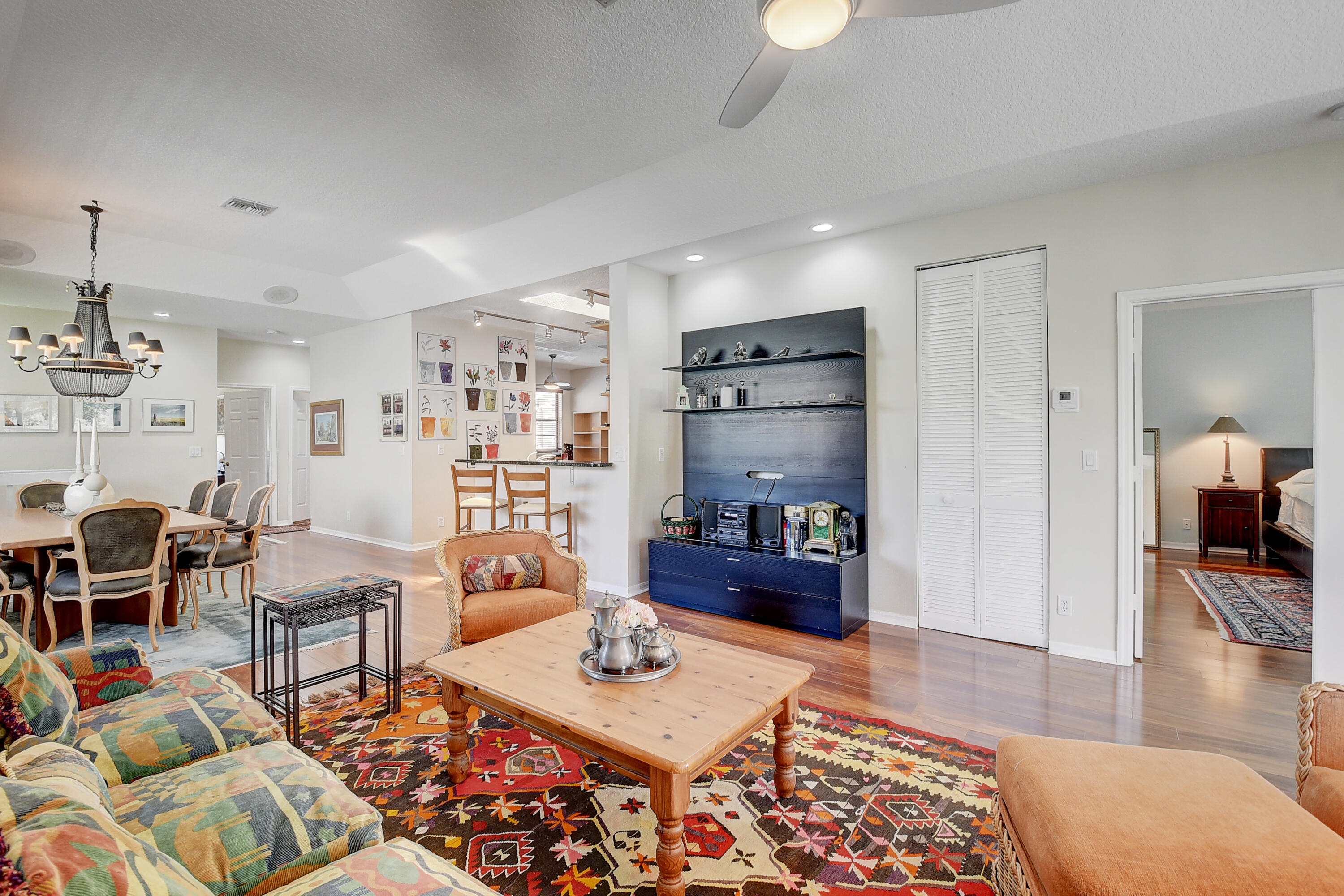 8652 Vía Reale, Unit 2 Boca Raton, FL 33496 - Photo 12 of 58 a living room with furniture and a wooden floor