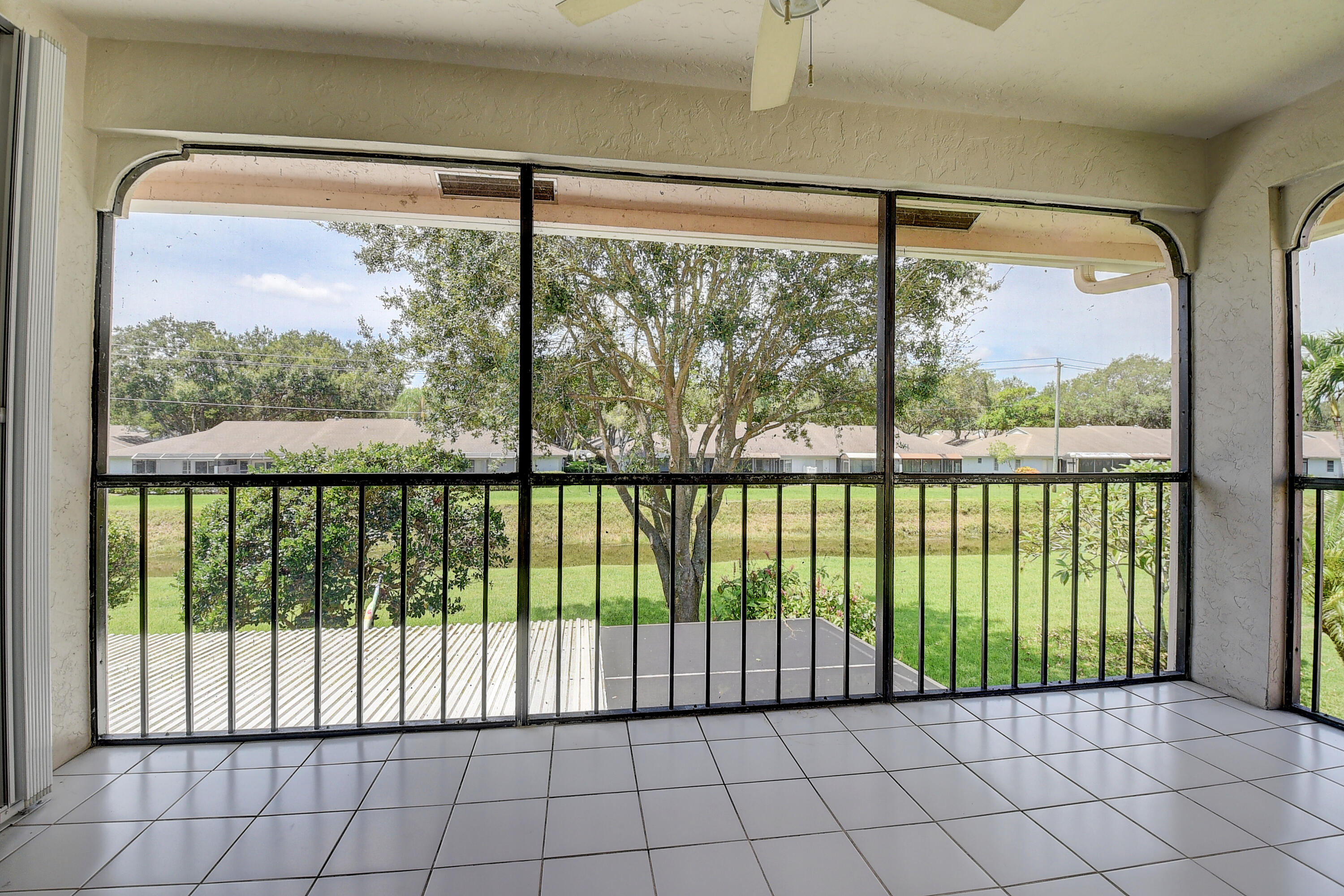 8652 Vía Reale, Unit 2 Boca Raton, FL 33496 - Photo 27 of 58 a view of a room with a large window
