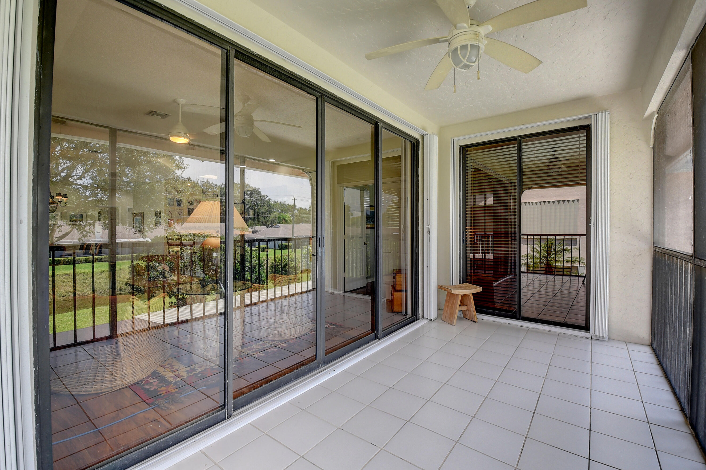 8652 Vía Reale, Unit 2 Boca Raton, FL 33496 - Photo 28 of 58 a view of an entryway with a glass door