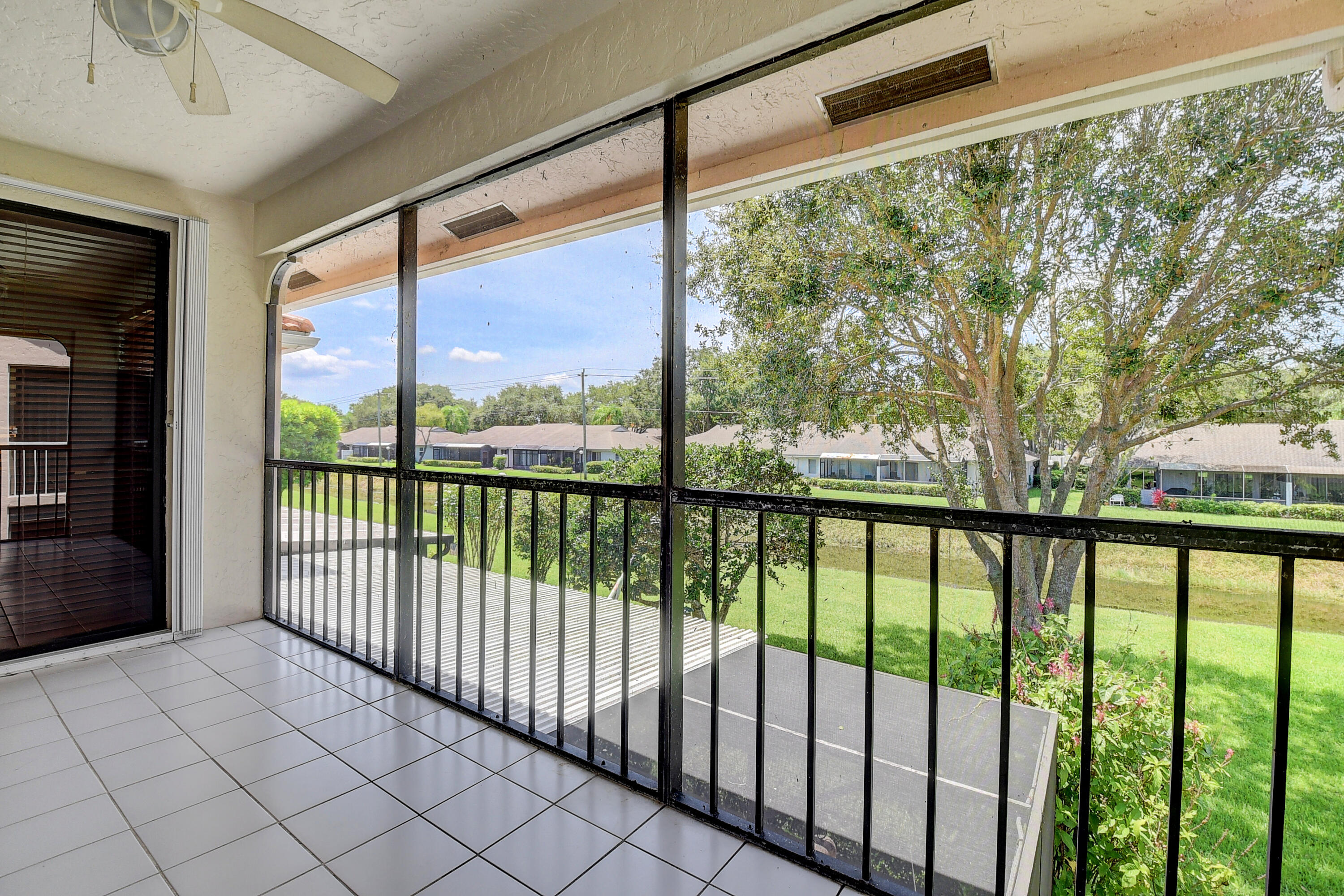 8652 Vía Reale, Unit 2 Boca Raton, FL 33496 - Photo 29 of 58 a view of a city street from a balcony