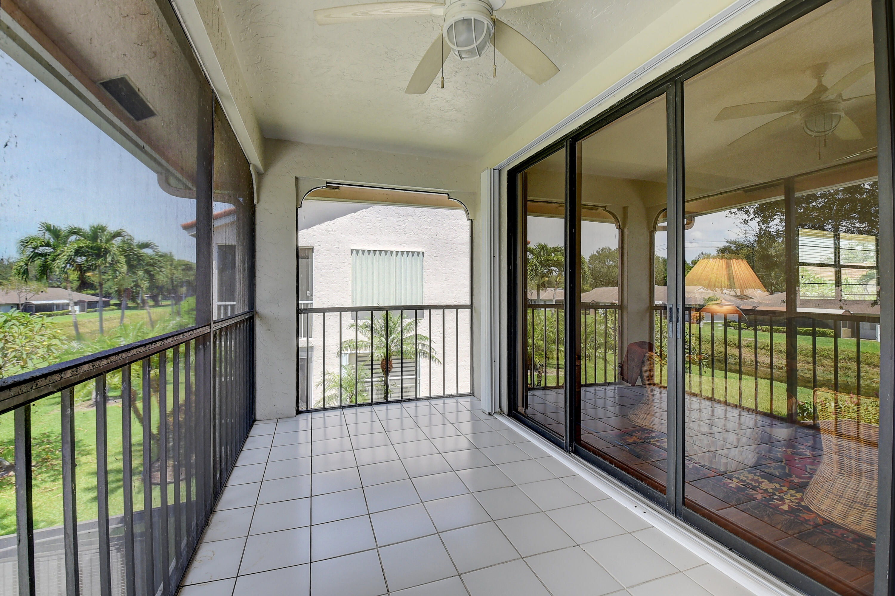 8652 Vía Reale, Unit 2 Boca Raton, FL 33496 - Photo 30 of 58 Covered/screened balcony