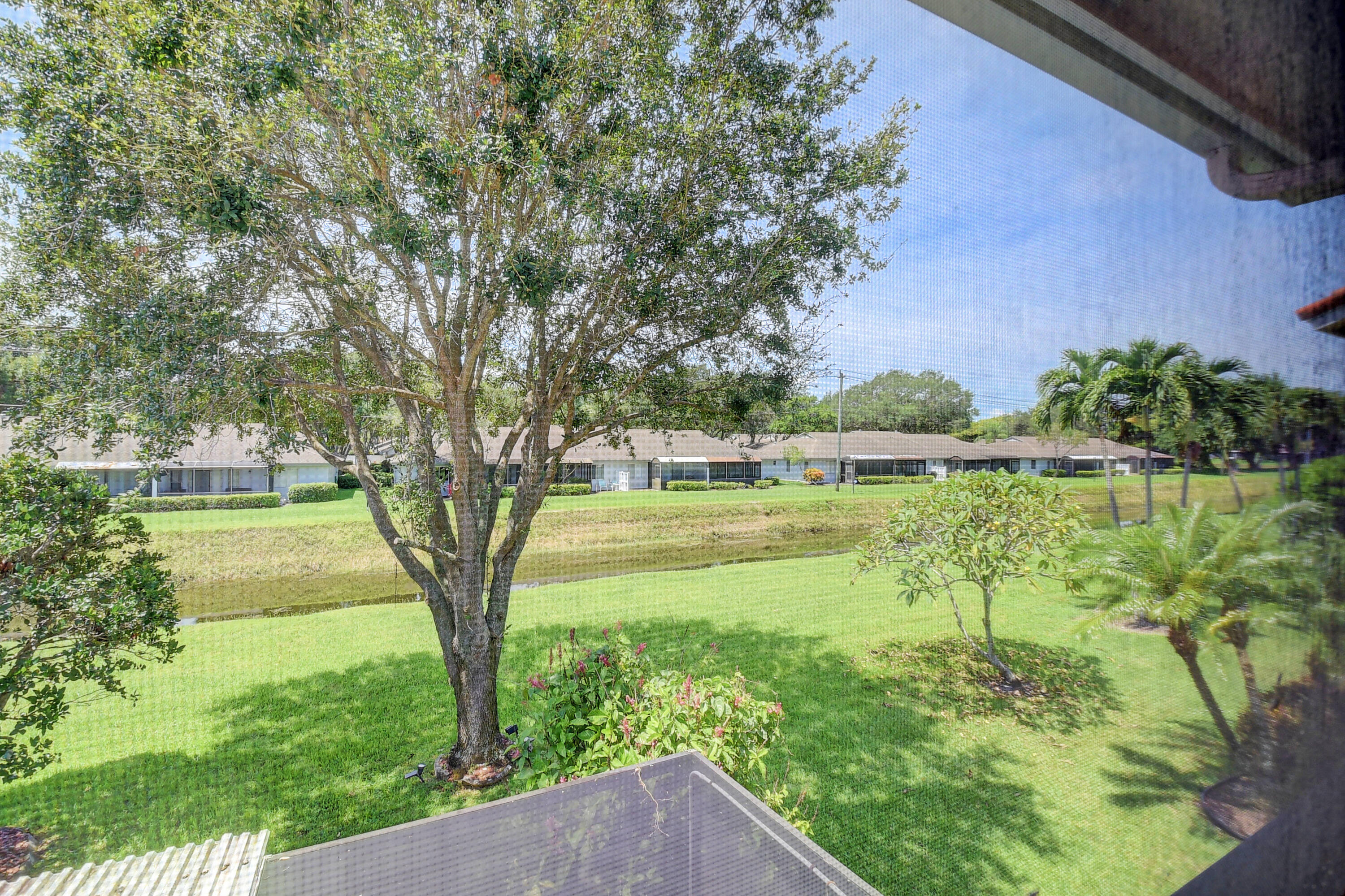 8652 Vía Reale, Unit 2 Boca Raton, FL 33496 - Photo 32 of 58 Rear view