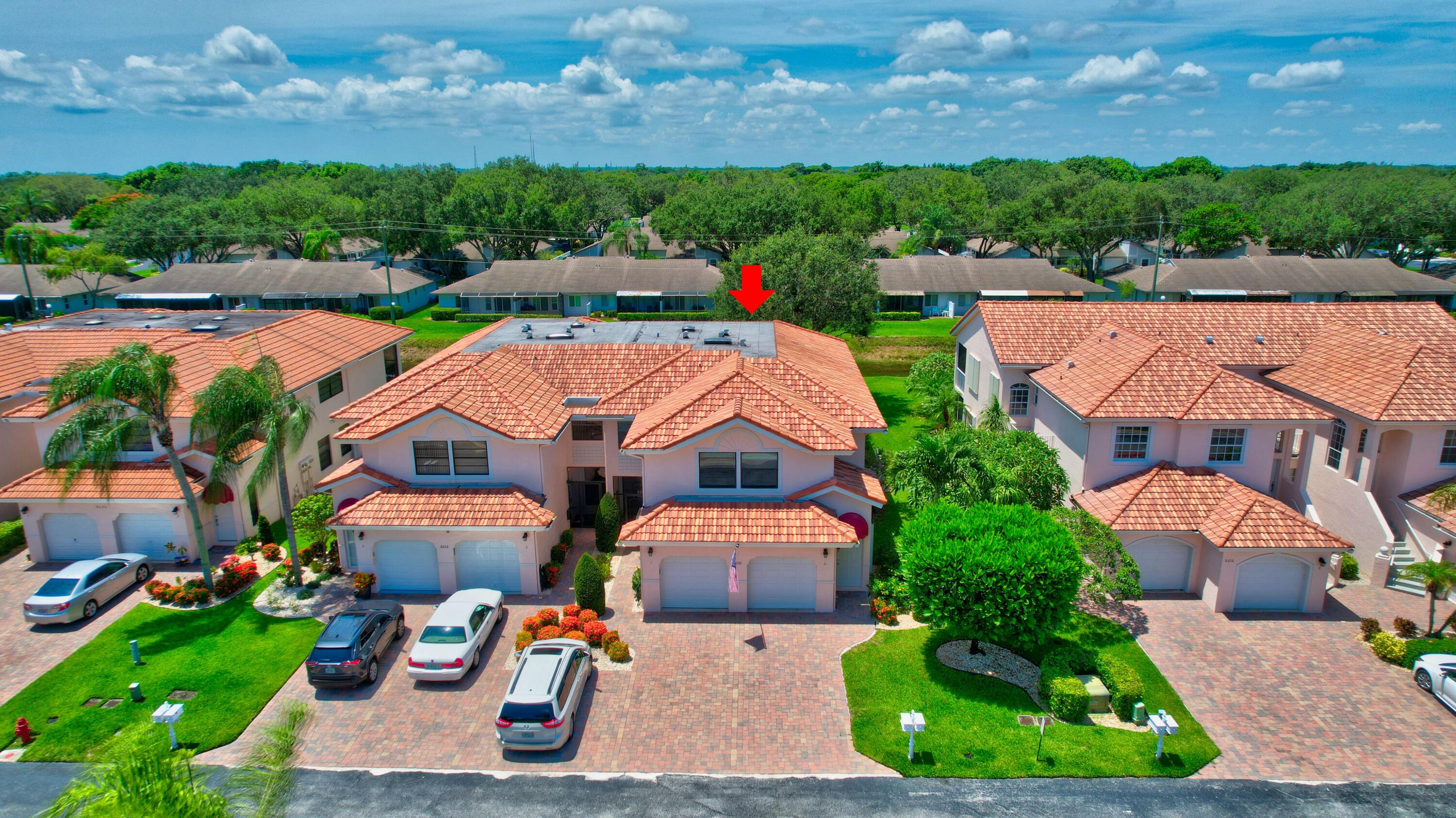 8652 Vía Reale, Unit 2 Boca Raton, FL 33496 - Photo 35 of 58 an aerial view of a houses with outdoor space and street view