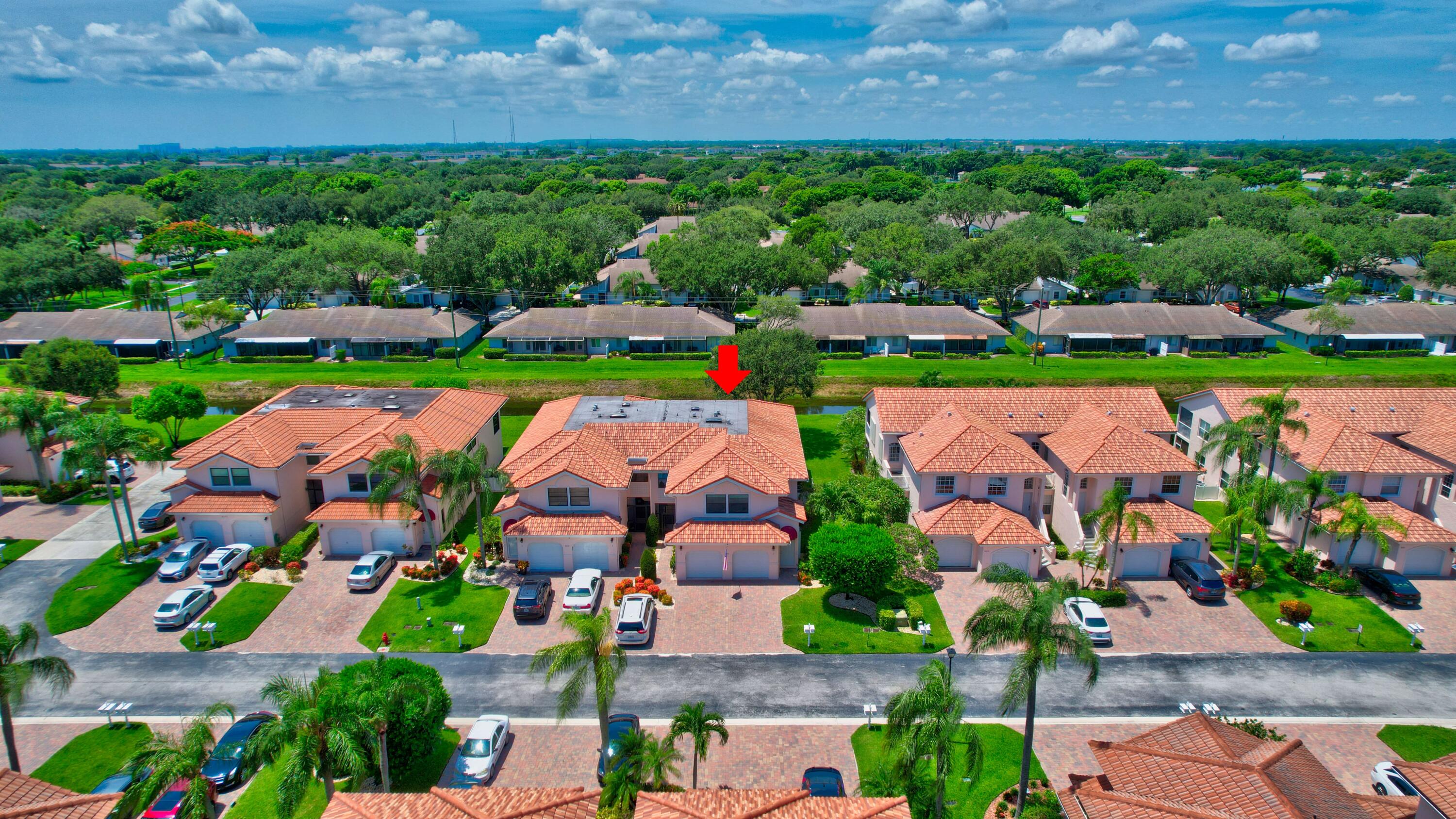 8652 Vía Reale, Unit 2 Boca Raton, FL 33496 - Photo 36 of 58 an aerial view of tennis court