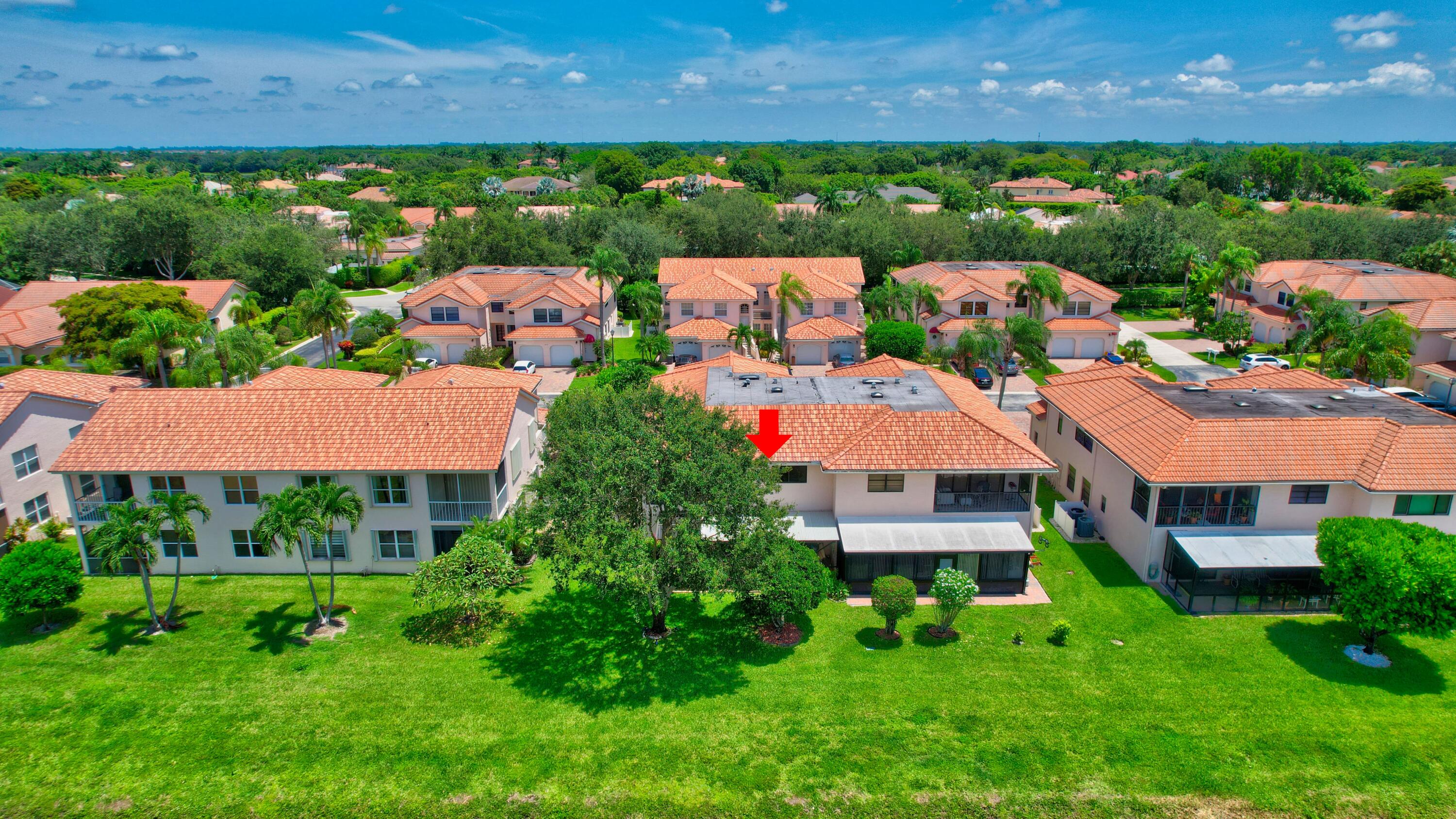 8652 Vía Reale, Unit 2 Boca Raton, FL 33496 - Photo 38 of 58 an aerial view of house with swimming pool outdoor seating and house