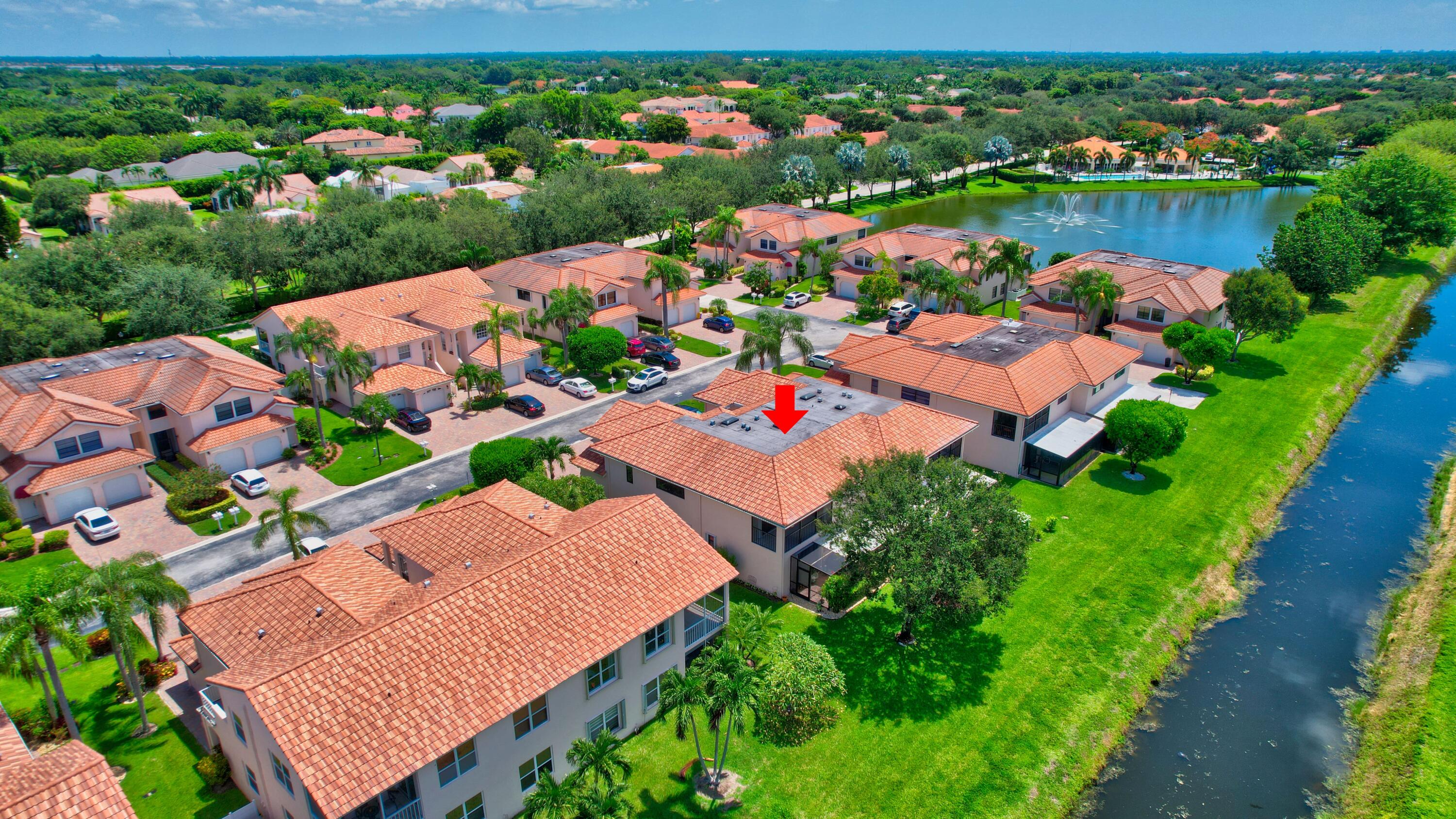 8652 Vía Reale, Unit 2 Boca Raton, FL 33496 - Photo 41 of 58 an aerial view of a houses and an outdoor space
