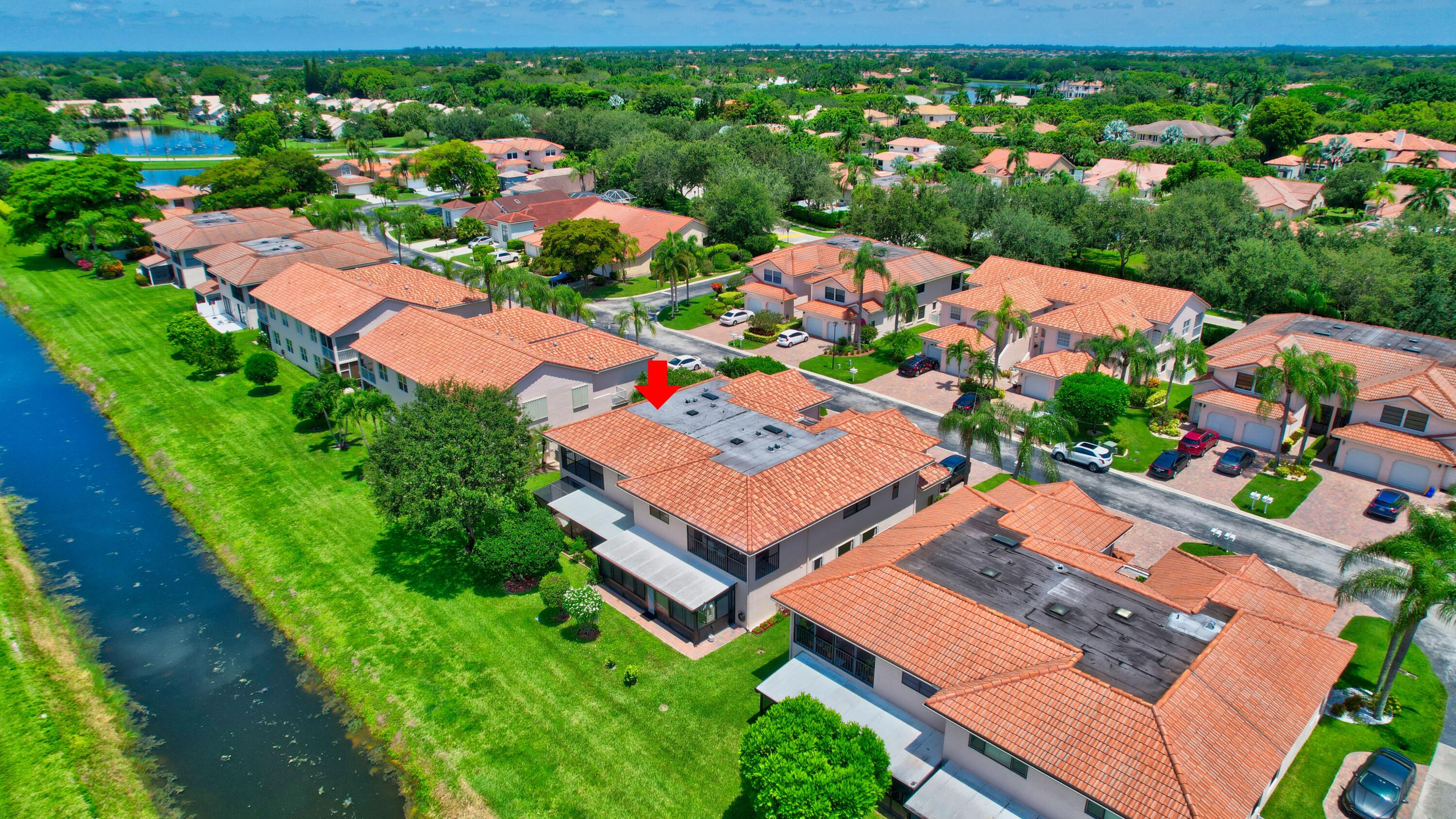 8652 Vía Reale, Unit 2 Boca Raton, FL 33496 - Photo 42 of 58 an aerial view of residential houses with outdoor space and street view