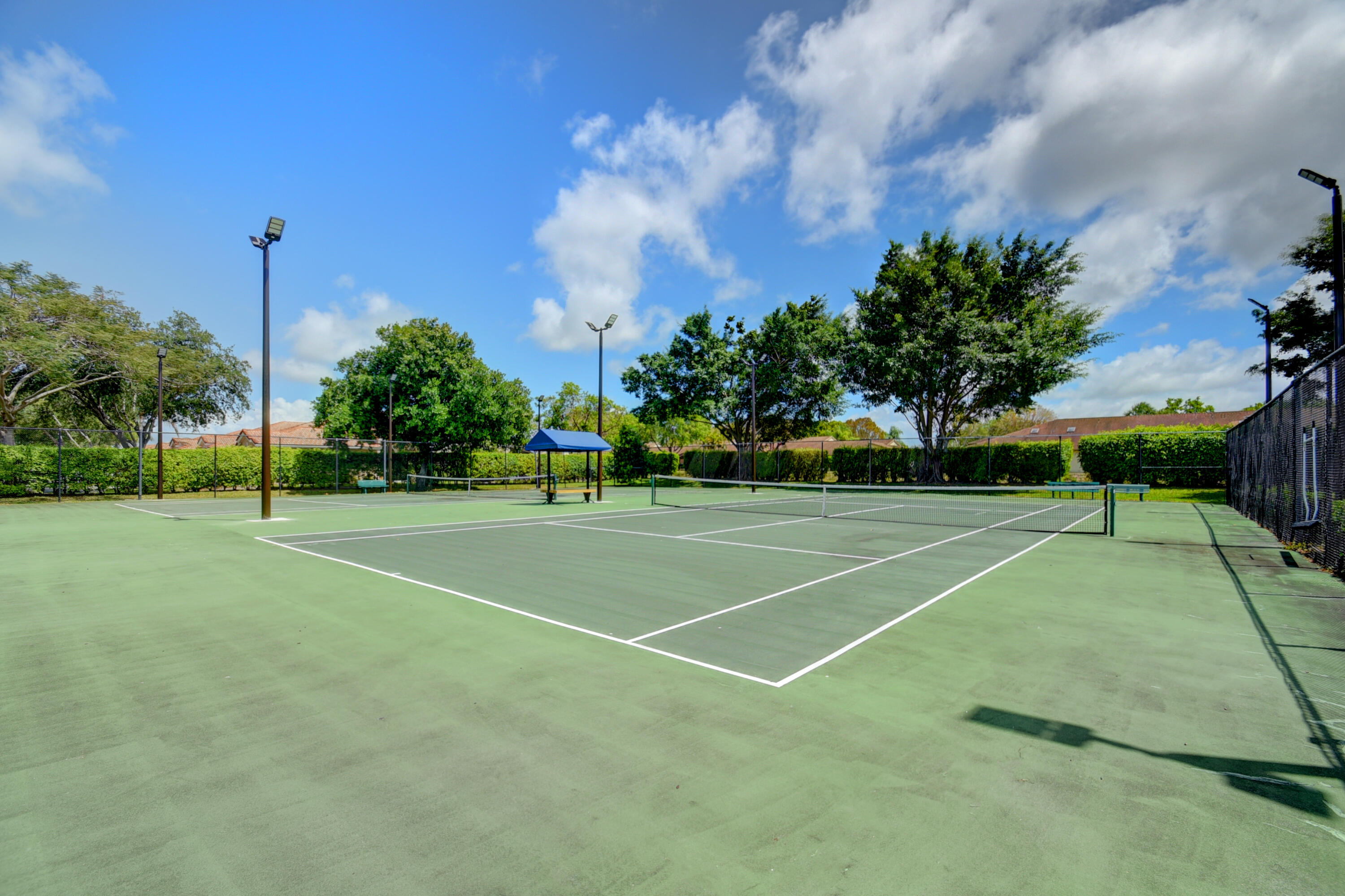8652 Vía Reale, Unit 2 Boca Raton, FL 33496 - Photo 54 of 58 a view of a tennis court
