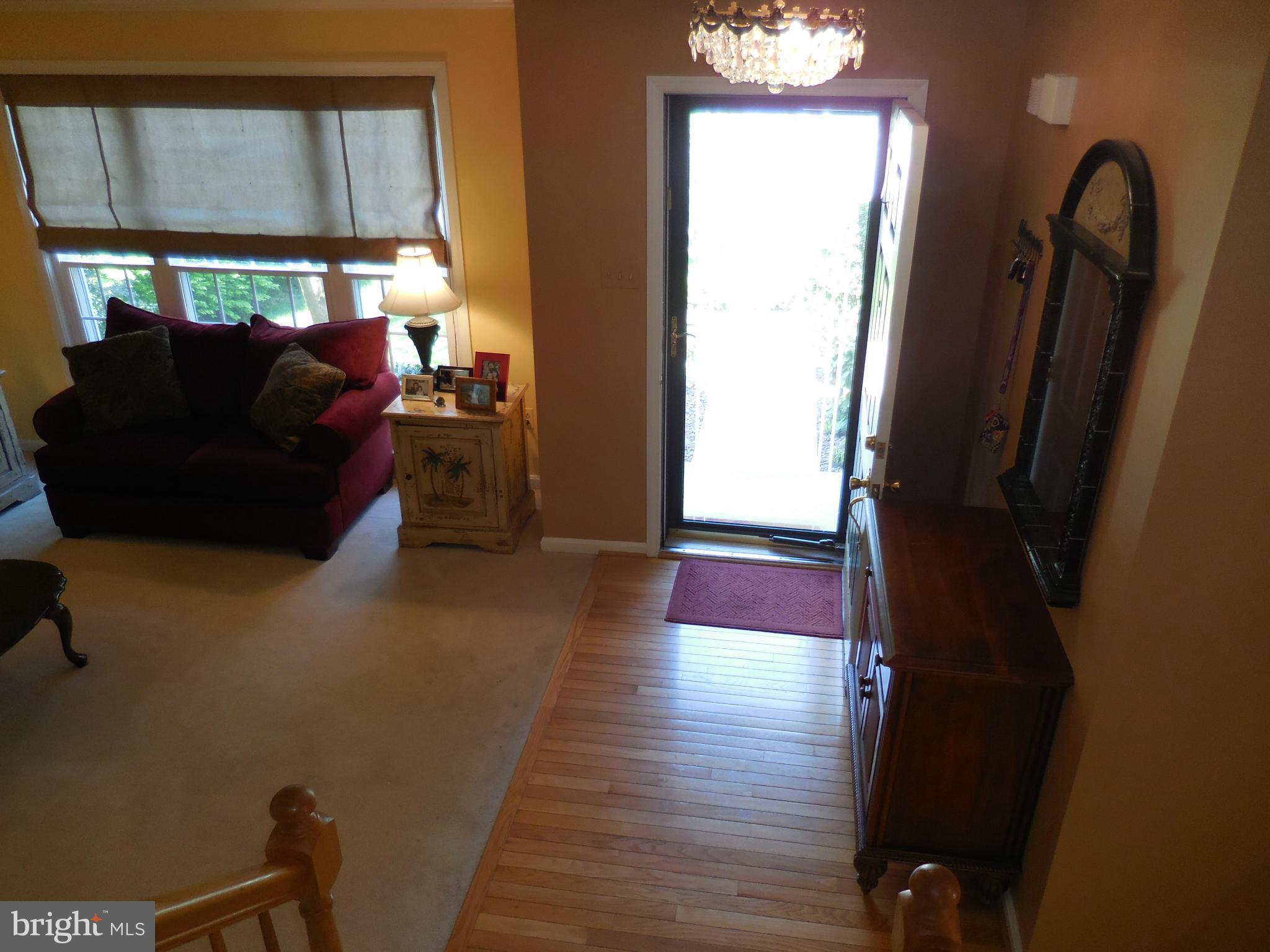 6474 Empty Song Road Columbia, MD 21044 - Photo 2 of 30 Entranceway With Hardwood Floors
