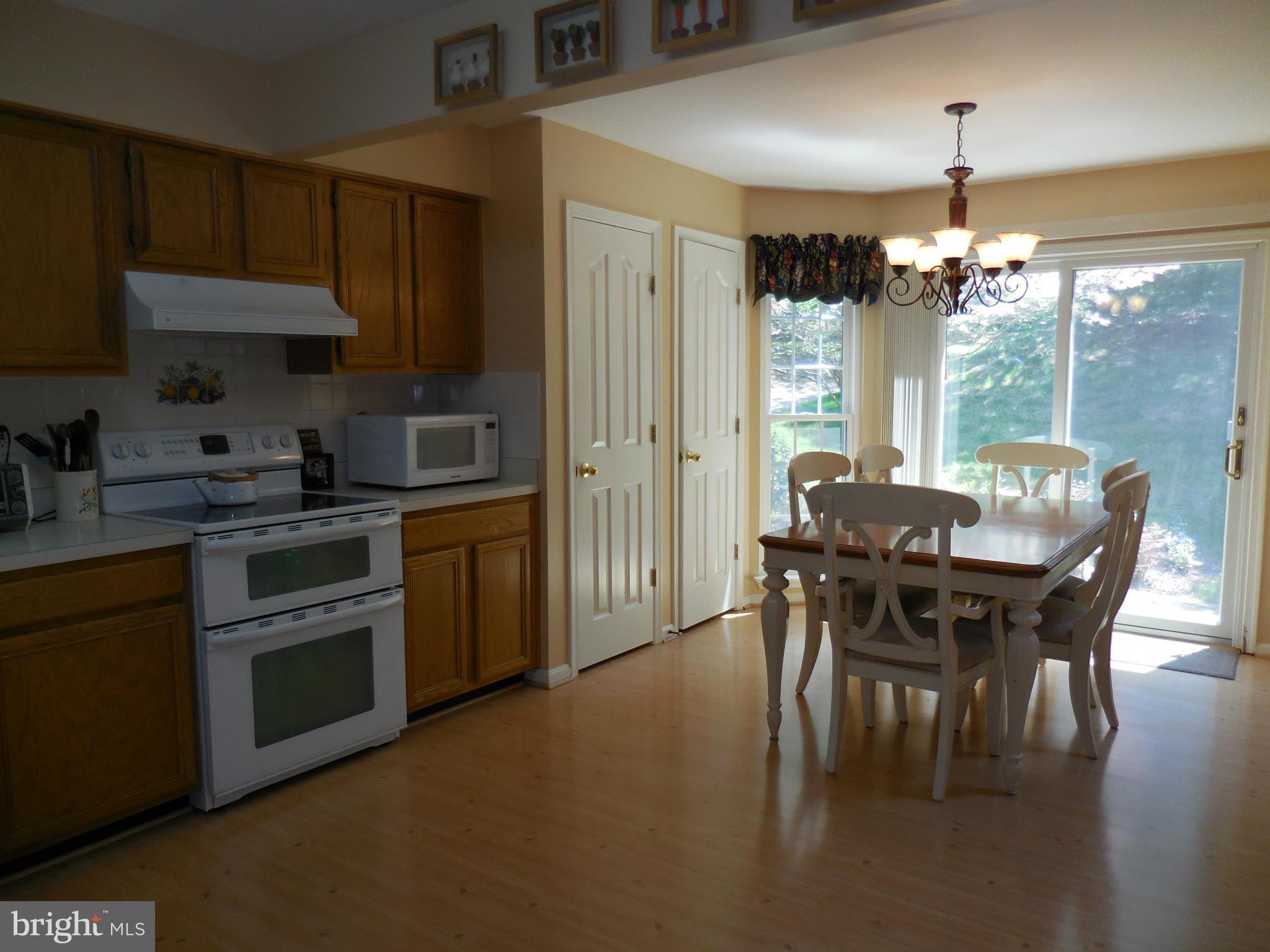 6474 Empty Song Road Columbia, MD 21044 - Photo 10 of 30 Eat-In-Kitchen Overlooking Backyard