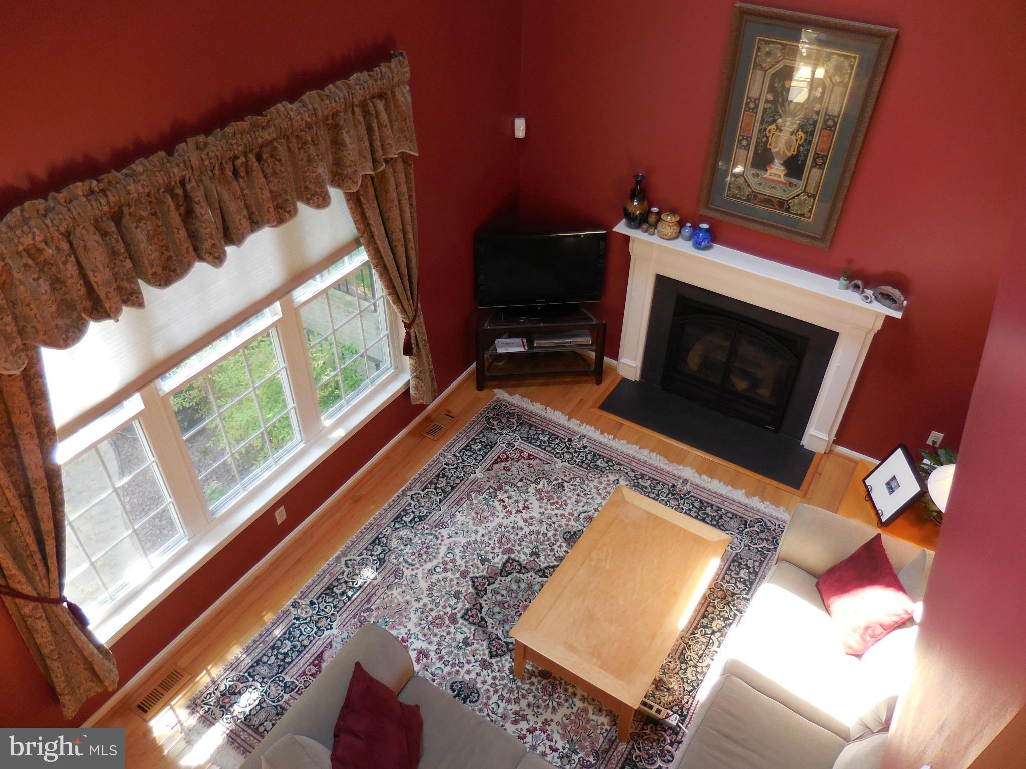 6474 Empty Song Road Columbia, MD 21044 - Photo 12 of 30 Family Room Has Gas Fireplace
