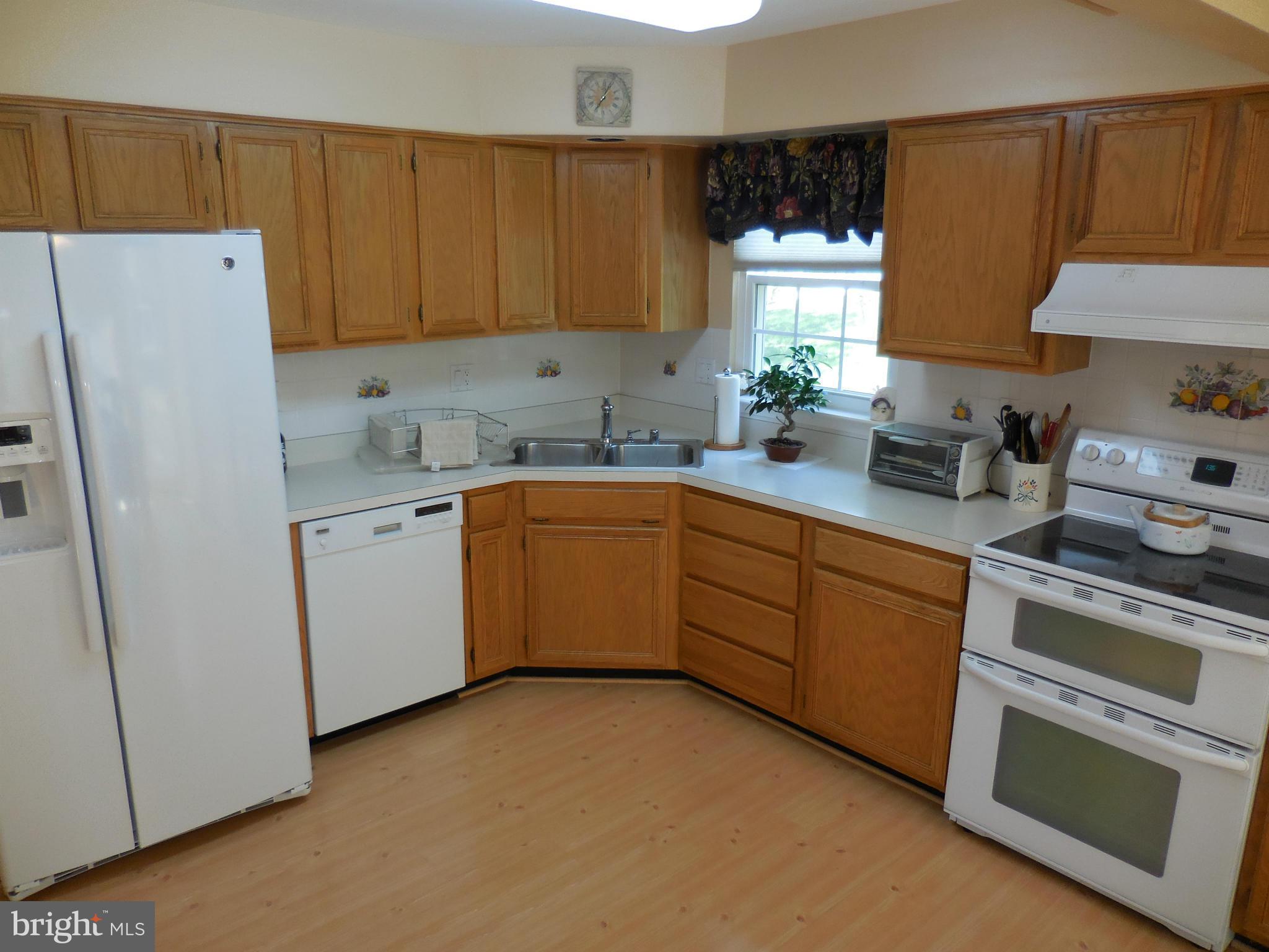 6474 Empty Song Road Columbia, MD 21044 - Photo 8 of 30 Lots of Cabinets In The Kitchen