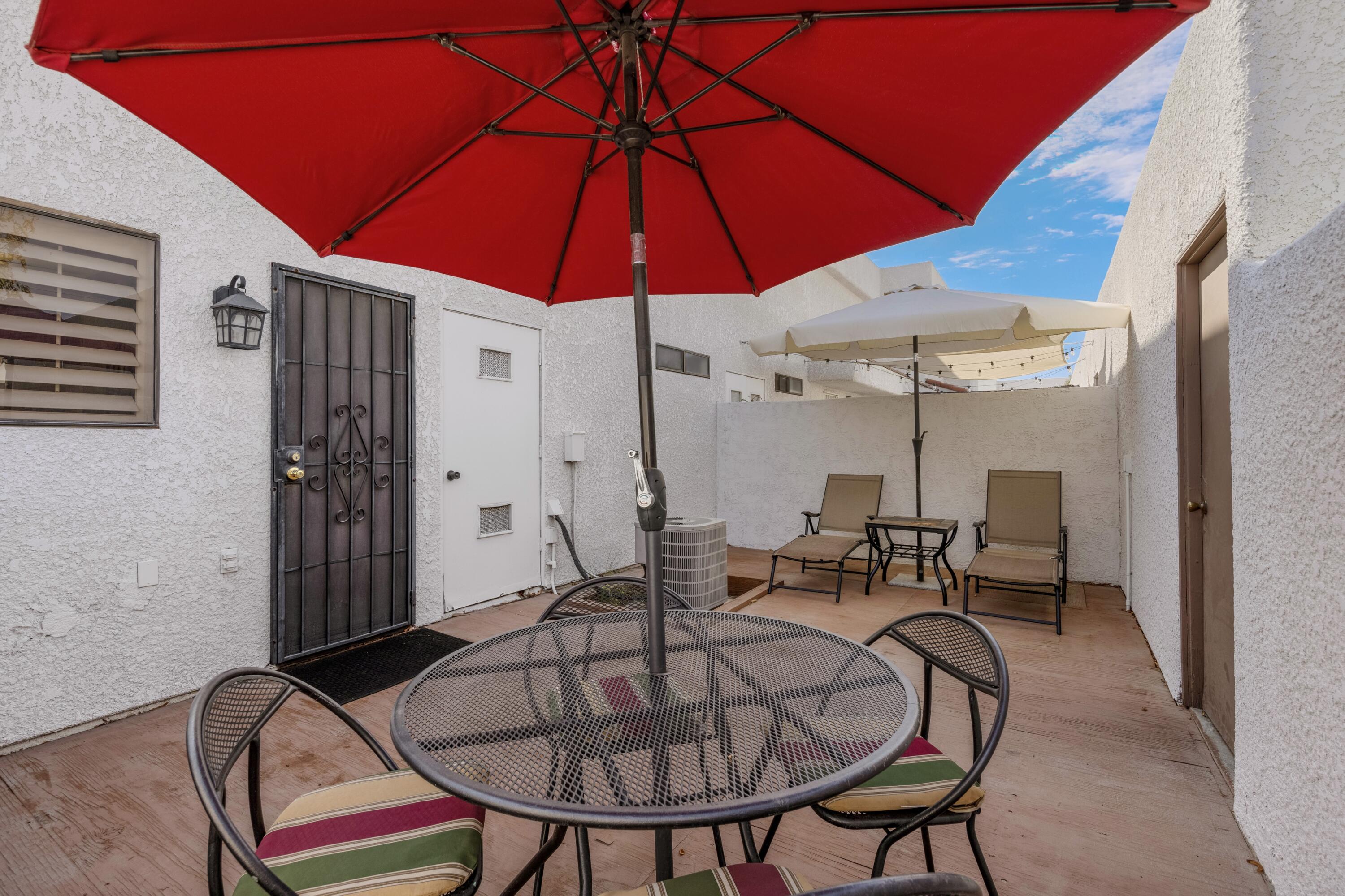 34352 Laura Way Rancho Mirage, CA 92270 - Photo 11 of 36 a table and chairs in the patio