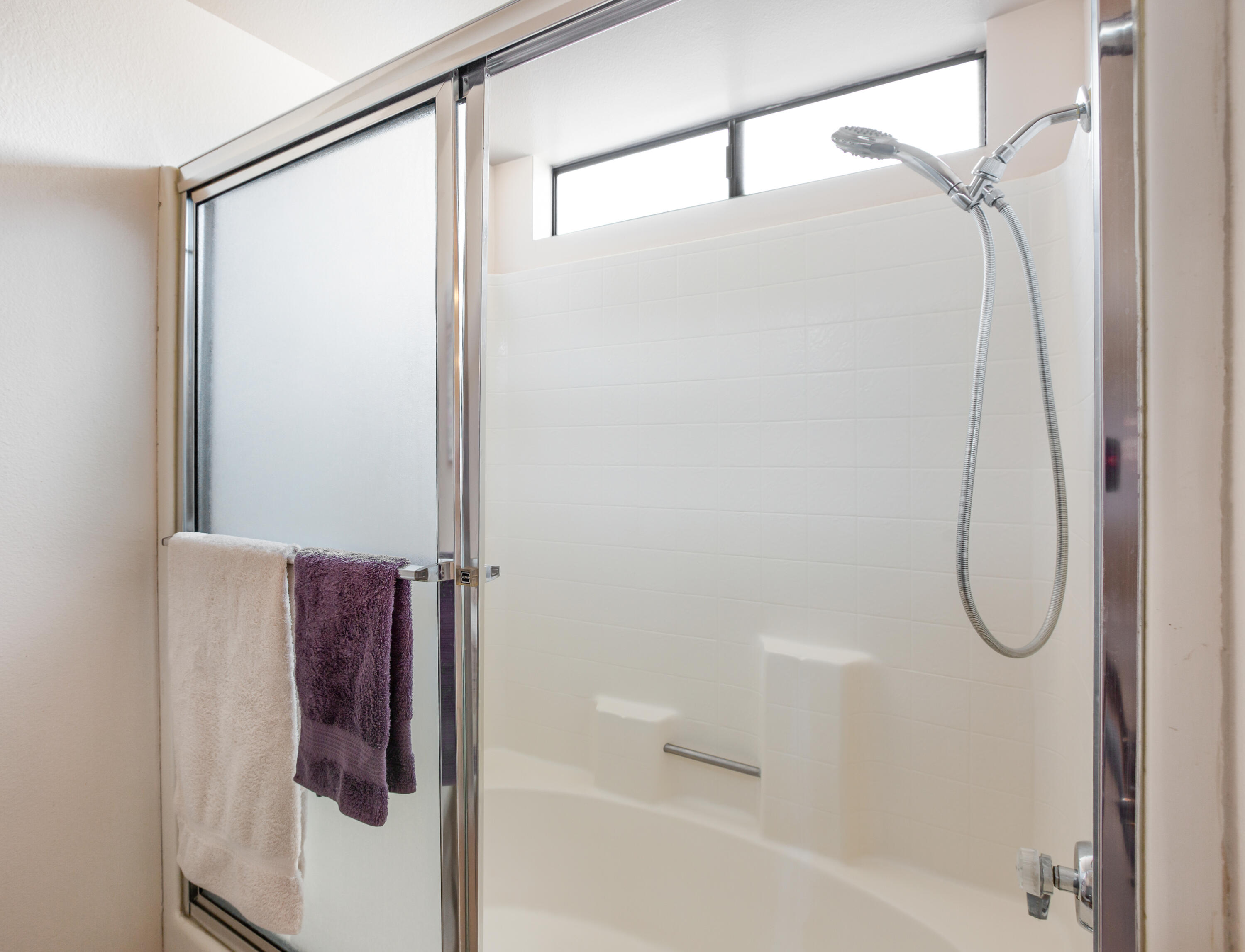 34352 Laura Way Rancho Mirage, CA 92270 - Photo 17 of 36 a bathroom that has a glass shower door