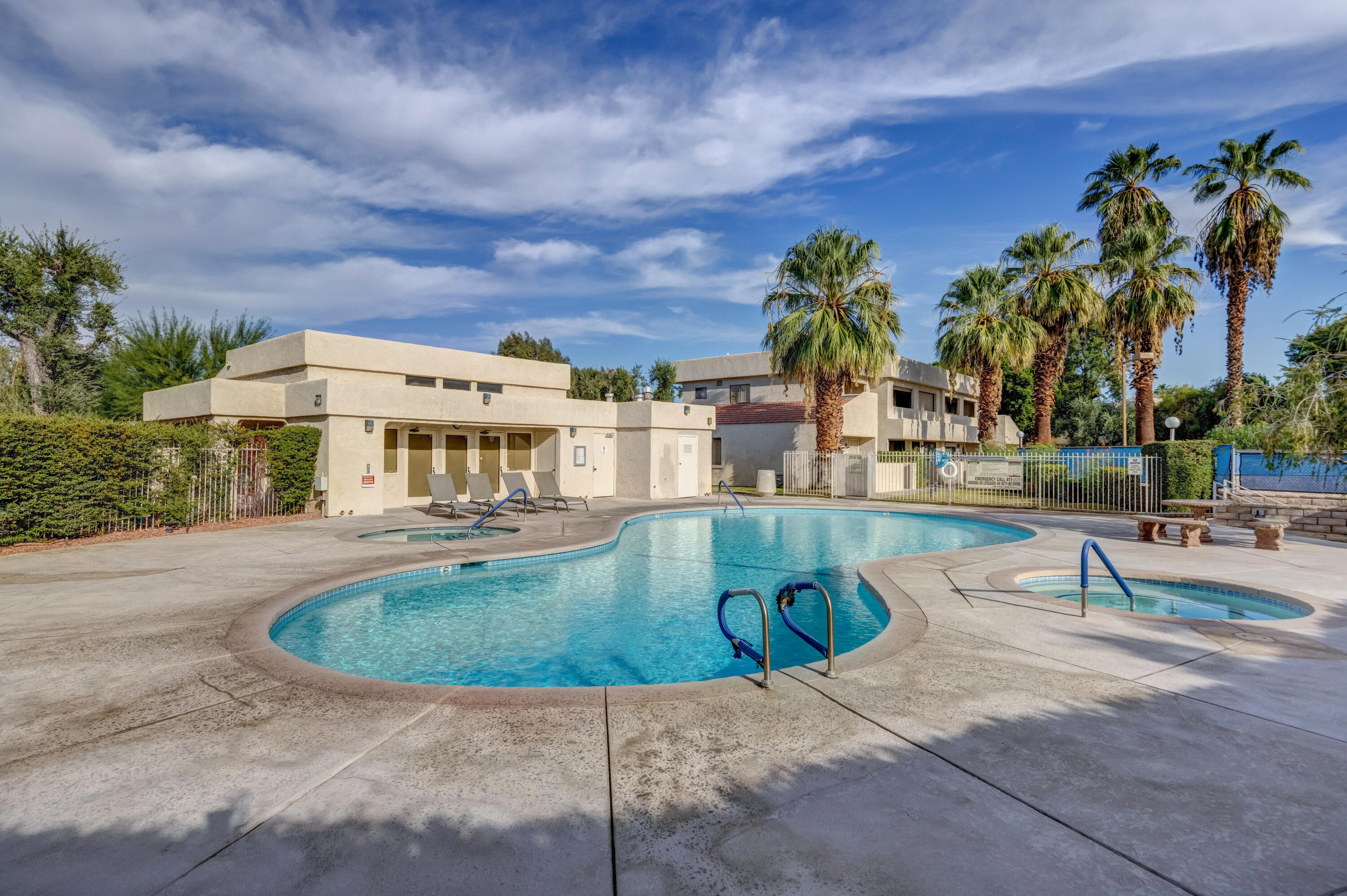 34352 Laura Way Rancho Mirage, CA 92270 - Photo 34 of 36 a view of a swimming pool with a patio