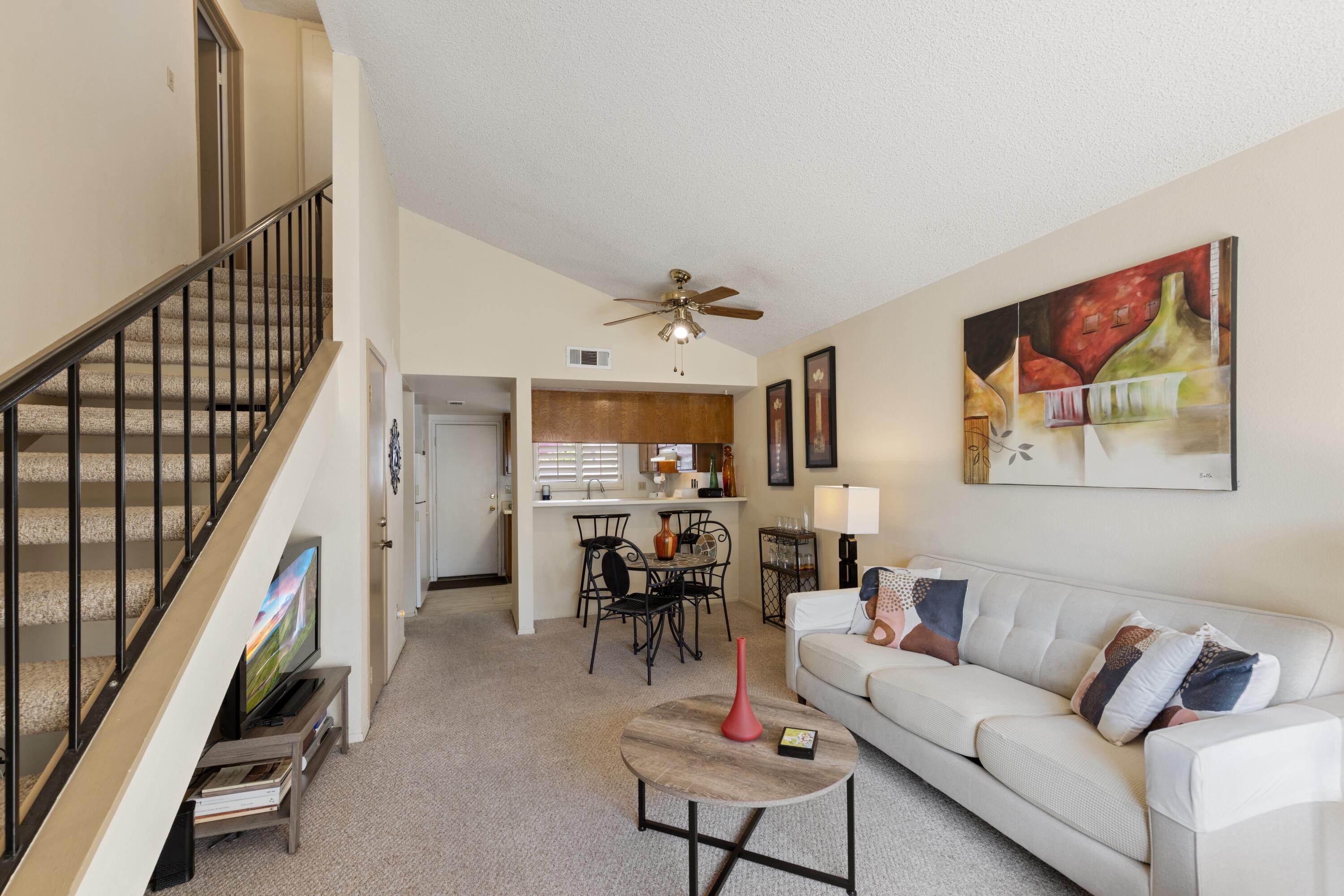34352 Laura Way Rancho Mirage, CA 92270 - Photo 4 of 36 a living room with furniture and wooden floor