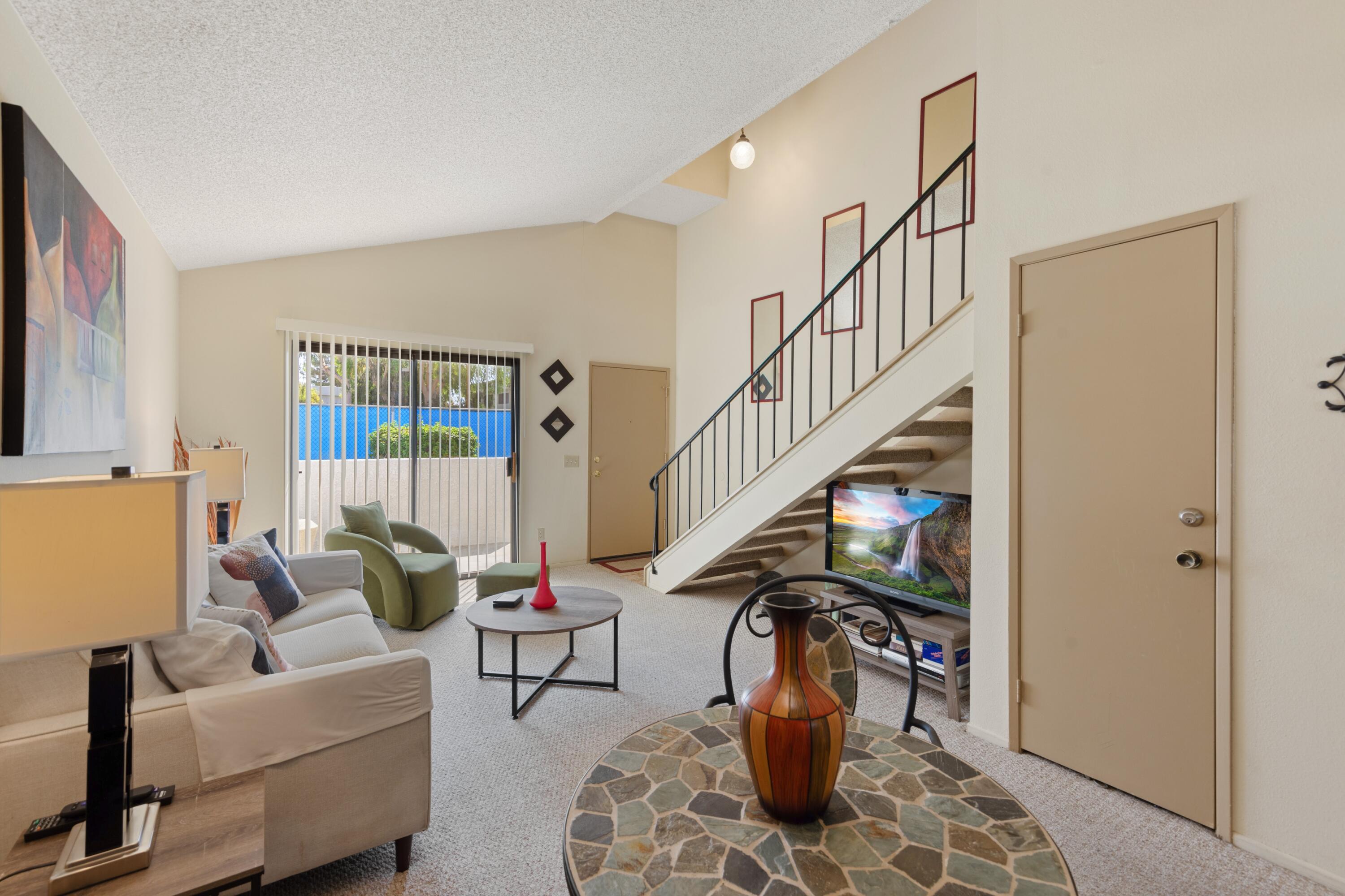 34352 Laura Way Rancho Mirage, CA 92270 - Photo 5 of 36 a living room with furniture and a rug