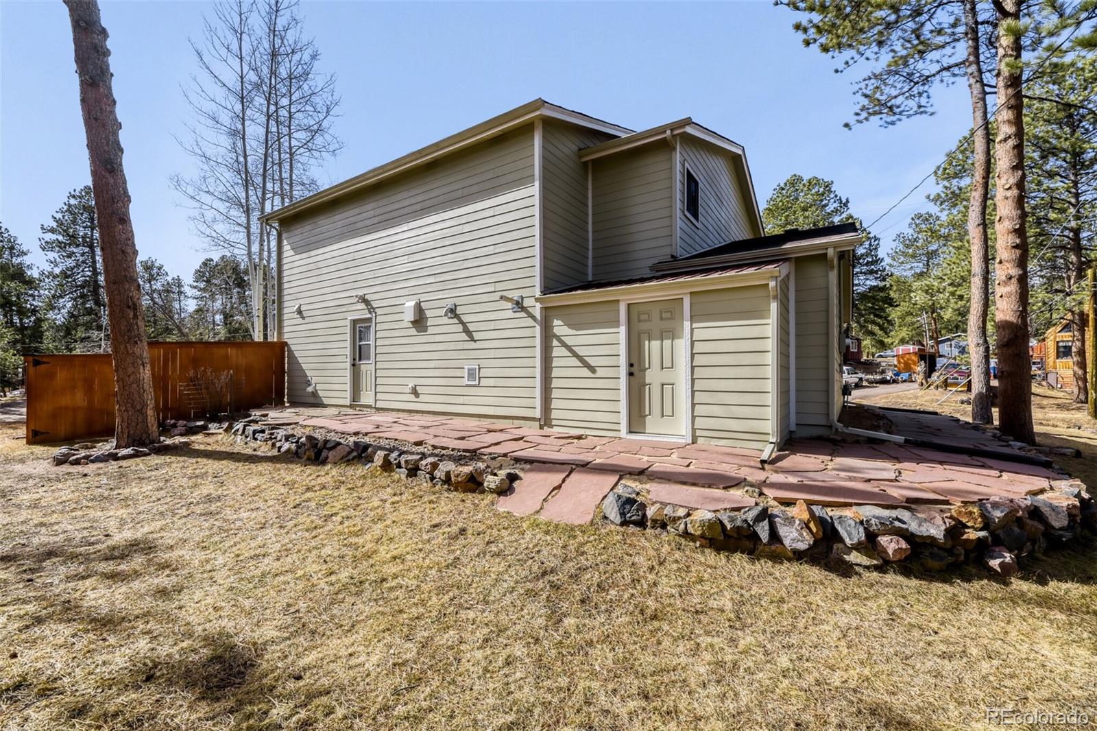 5000 Elizabeth Lane Evergreen, CO 80439 - Photo 26 of 30 a view of a house with a yard