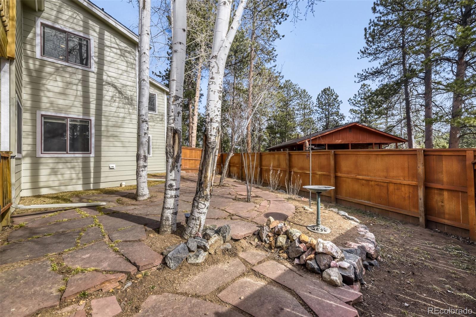5000 Elizabeth Lane Evergreen, CO 80439 - Photo 28 of 30 a view of a house with backyard