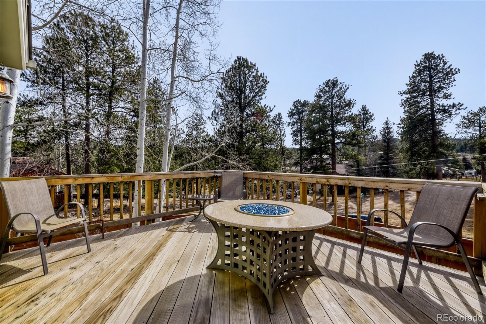 5000 Elizabeth Lane Evergreen, CO 80439 - Photo 29 of 30 a view of a chairs and table on the roof deck