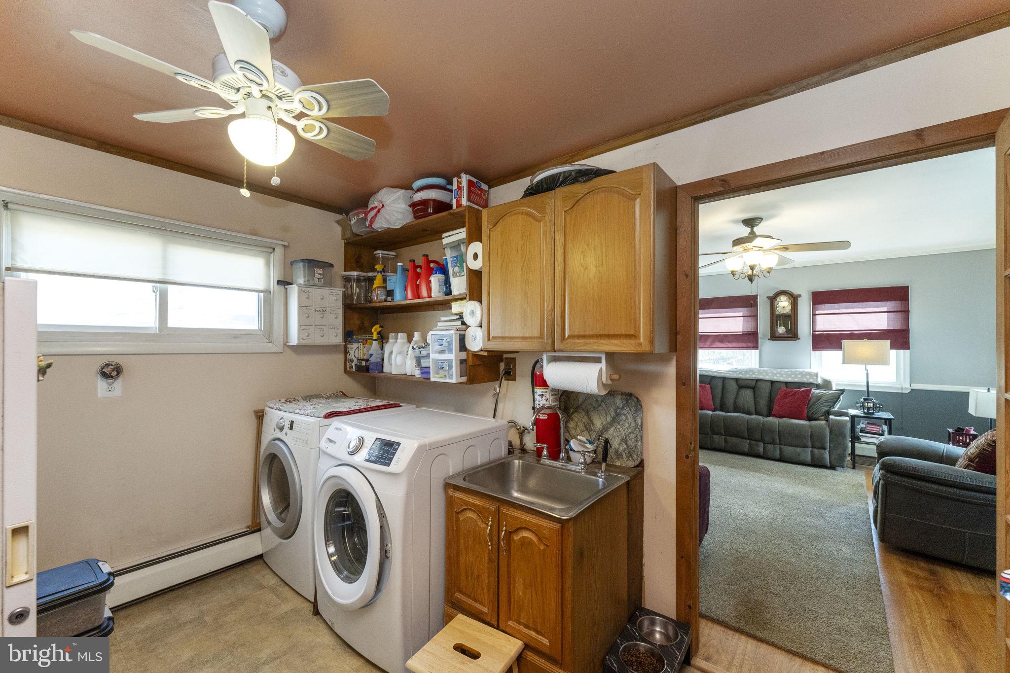 60 Inland Road Levittown, PA 19057 - Photo 14 of 32 a view of living room with washer and dryer