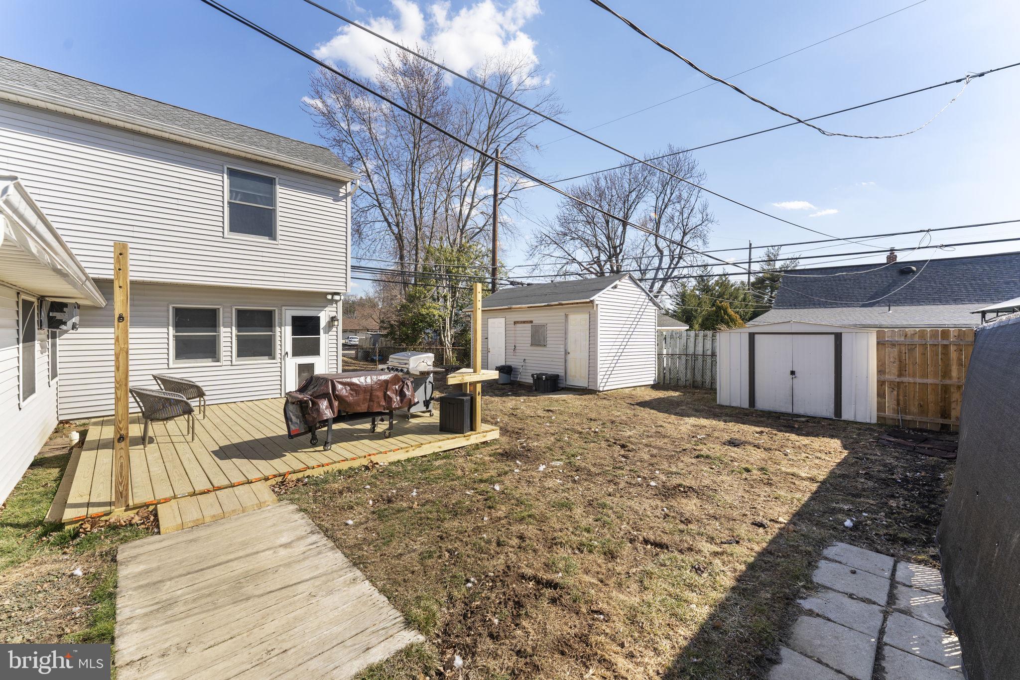 60 Inland Road Levittown, PA 19057 - Photo 18 of 32 a view of a house with sitting area and barbeque oven