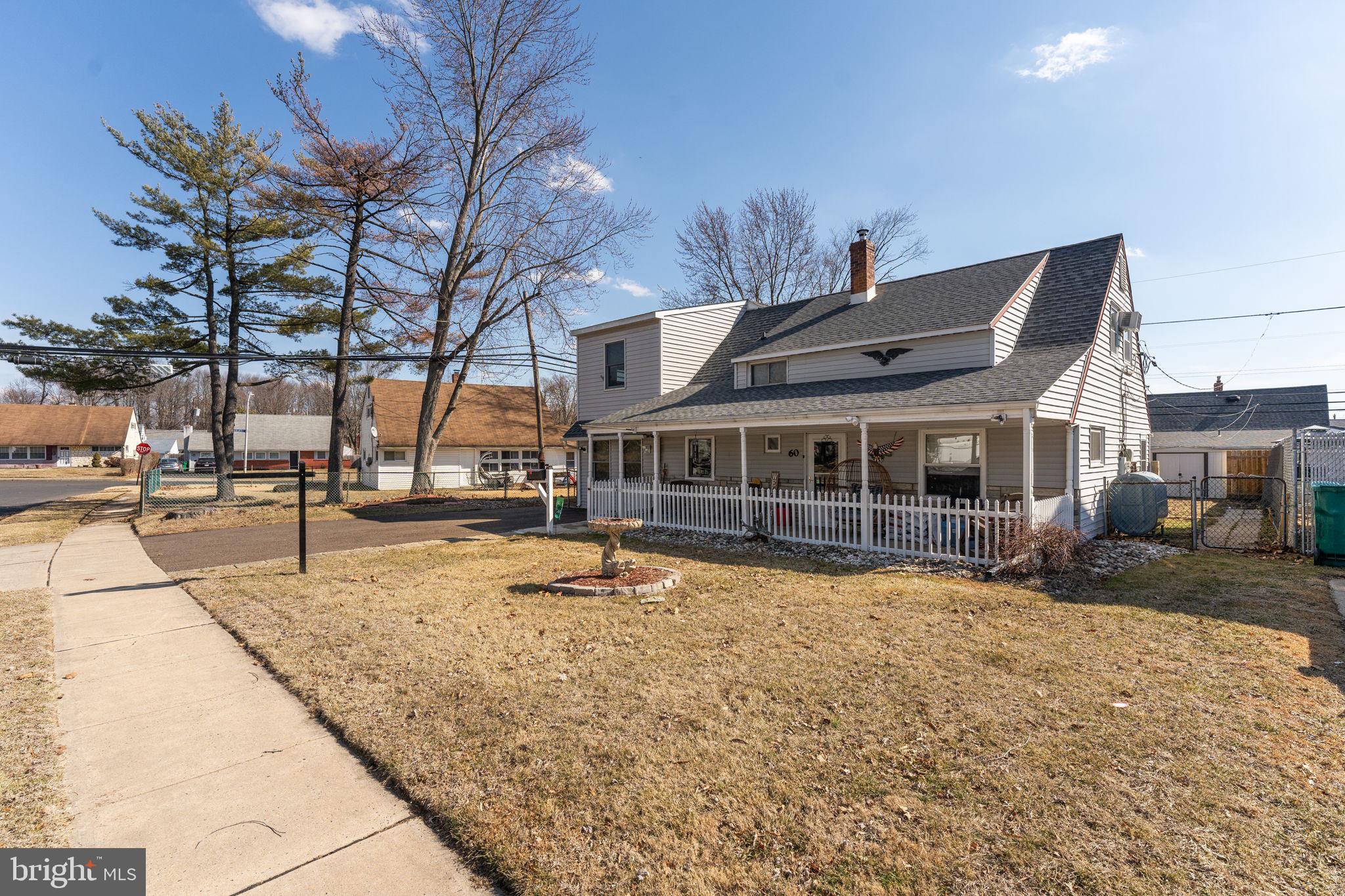 60 Inland Road Levittown, PA 19057 - Photo 7 of 32 a view of a house with a yard