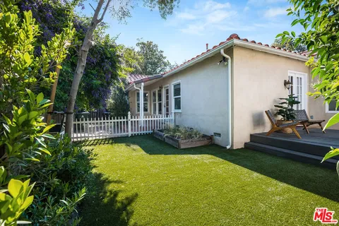 a house view with a garden space