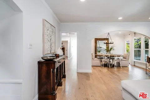 a view of a living room and dining room