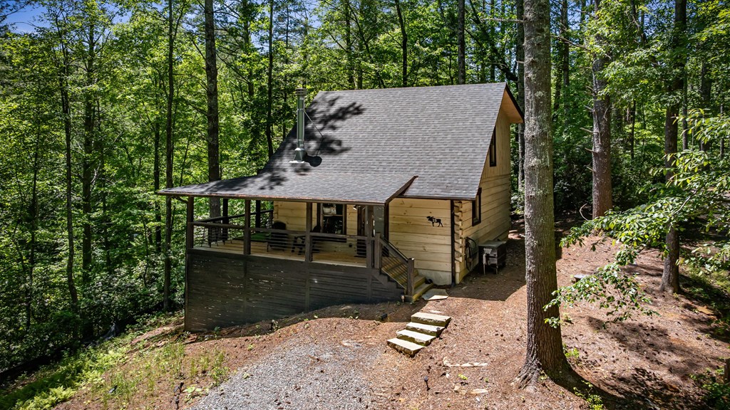 25 Hidden Ridge Cherry Log, GA 30522 - Photo 3 of 52 an aerial view of a house with yard