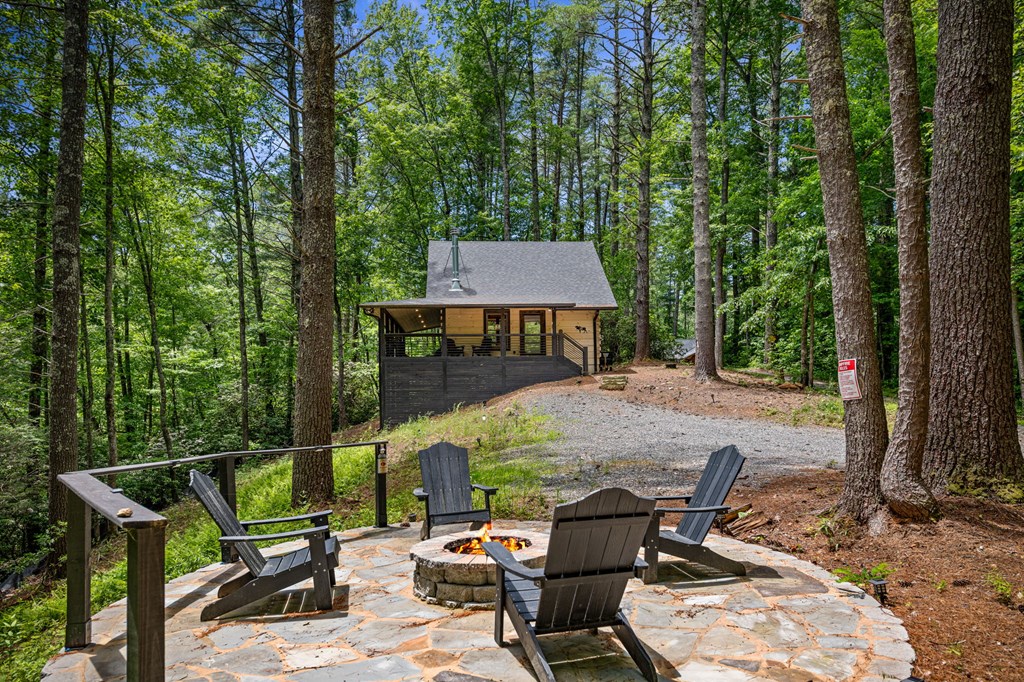 25 Hidden Ridge Cherry Log, GA 30522 - Photo 4 of 52 a view of backyard with seating space and trees