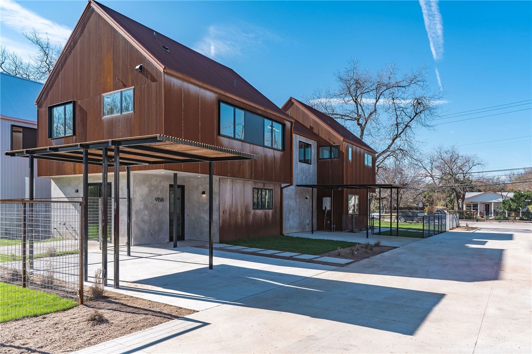 915 Tillery Street, Unit B Austin, TX 78702 - Photo 1 of 1 a front view of a house with a garden