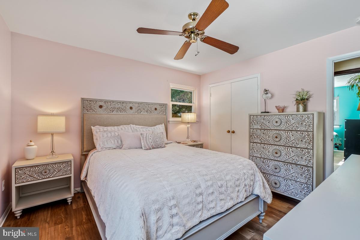 24357 Flamingo Terrace Gaithersburg, MD 20882 - Photo 27 of 41 a bedroom with a bed and a dresser