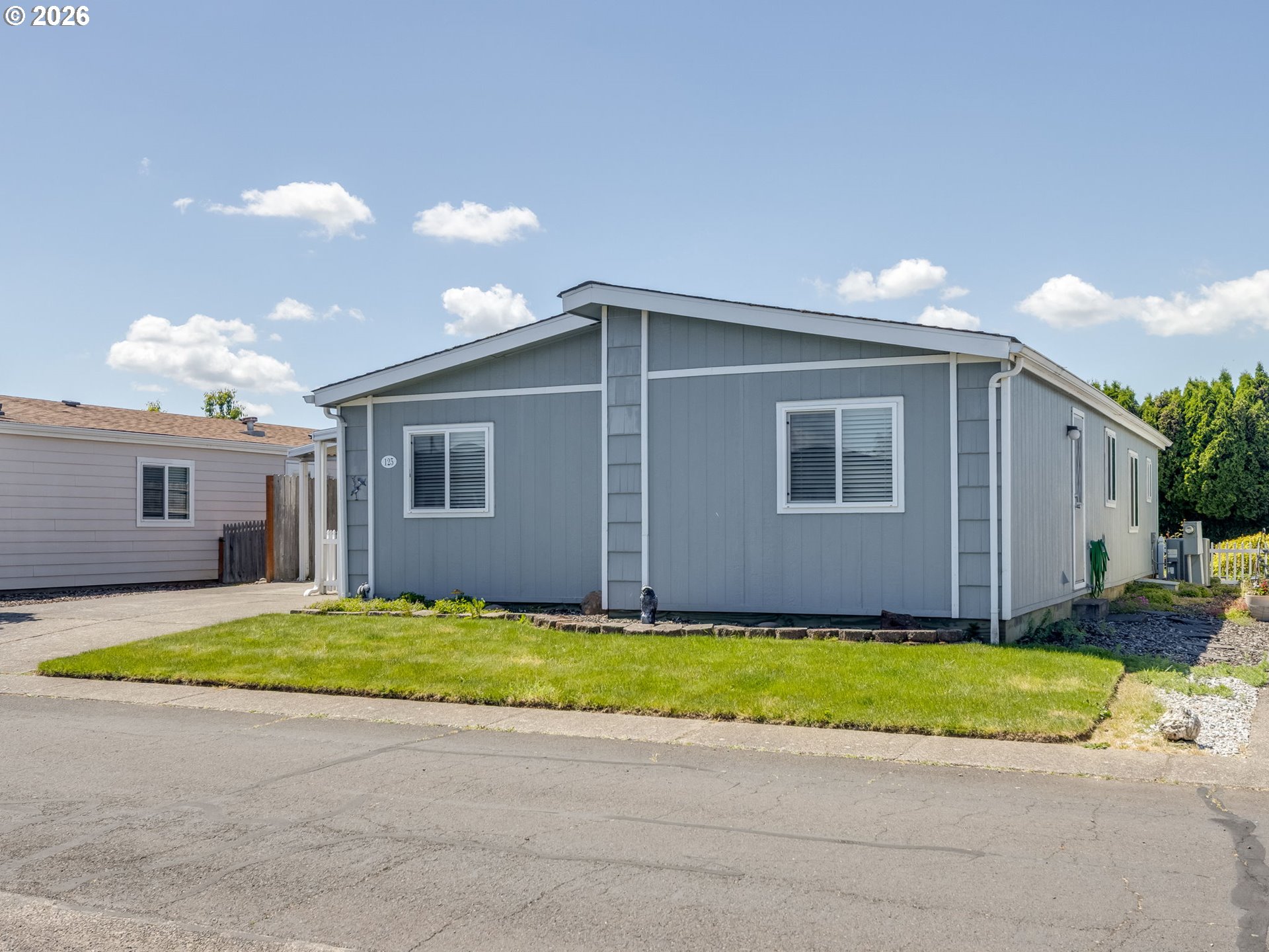 4730 Auburn Road Northeast, Unit 125 Salem, OR 97301 - Photo 12 of 36 a view of a house with a backyard