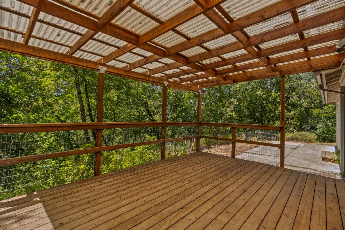24895 Skyland Road Los Gatos, CA 95033 - Photo 89 of 113 a view of a balcony with wooden floor
