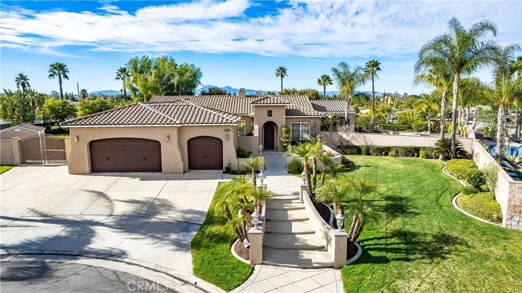 8084 Citricado Lane Riverside, CA 92508 - Photo 1 of 1 a front view of a house with a yard