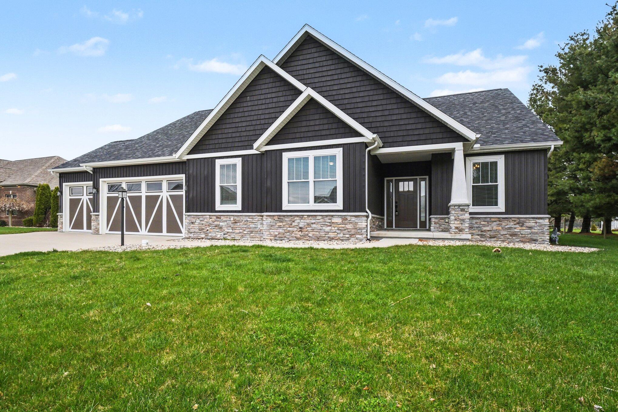 20009 Weber Lane Goshen, IN 46528 - Photo 1 of 17 a front view of house with yard and green space
