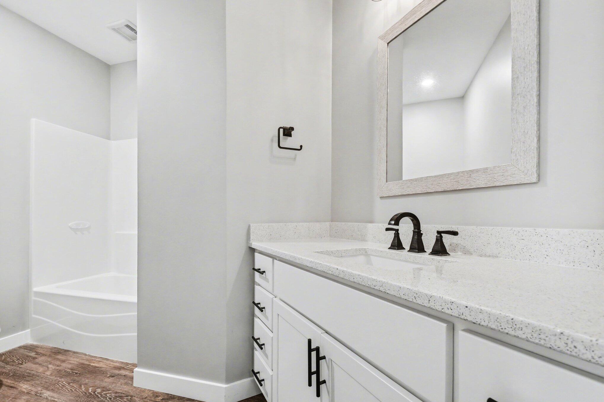 20009 Weber Lane Goshen, IN 46528 - Photo 12 of 17 a bathroom with a sink and a mirror