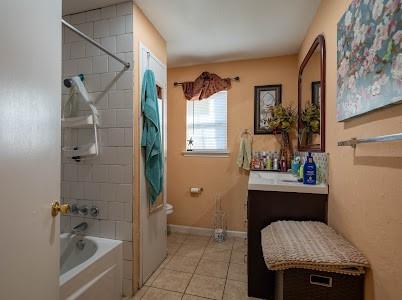 2133 Pleasant Drive Dallas, TX 75227 - Photo 32 of 40 Full bathroom with bathtub / shower combination and light tile patterned flooring