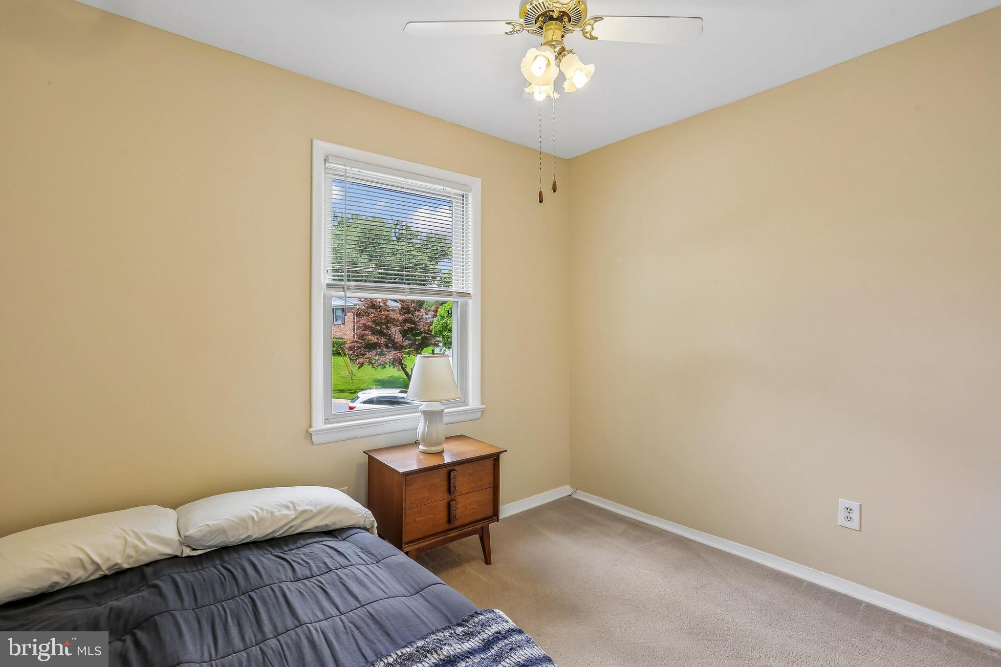 2 Foxhall Court Silver Spring, MD 20906 - Photo 50 of 86 a bedroom with a bed and a window
