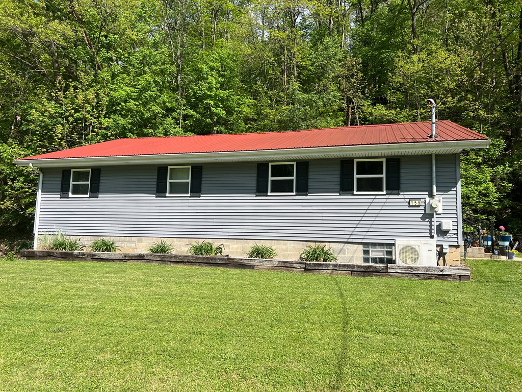 155 Cherry Run Road Rouseville, PA 16344 - Photo 19 of 19 a front view of a house with a yard