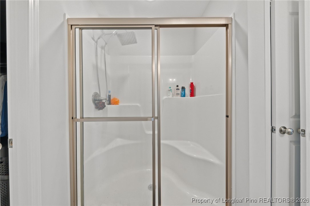 522 Carolina Church Road St. Pauls, NC 28384 - Photo 19 of 36 a bathroom with a shower