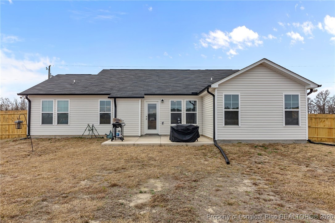 522 Carolina Church Road St. Pauls, NC 28384 - Photo 2 of 36 a house view with a sitting space and garden space